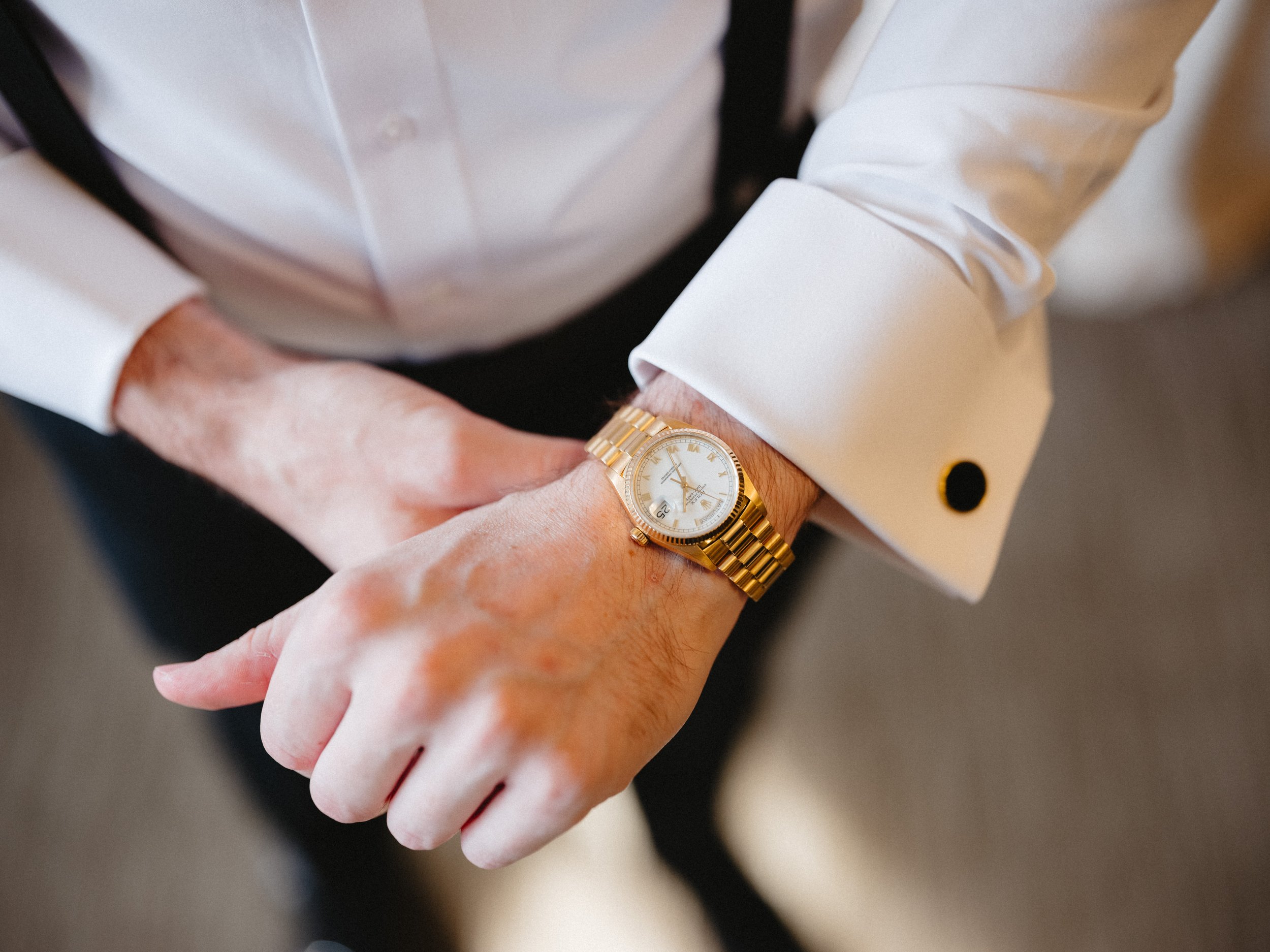 NASSAU INN PRINCETON NJ Venue-groom with watch.jpg