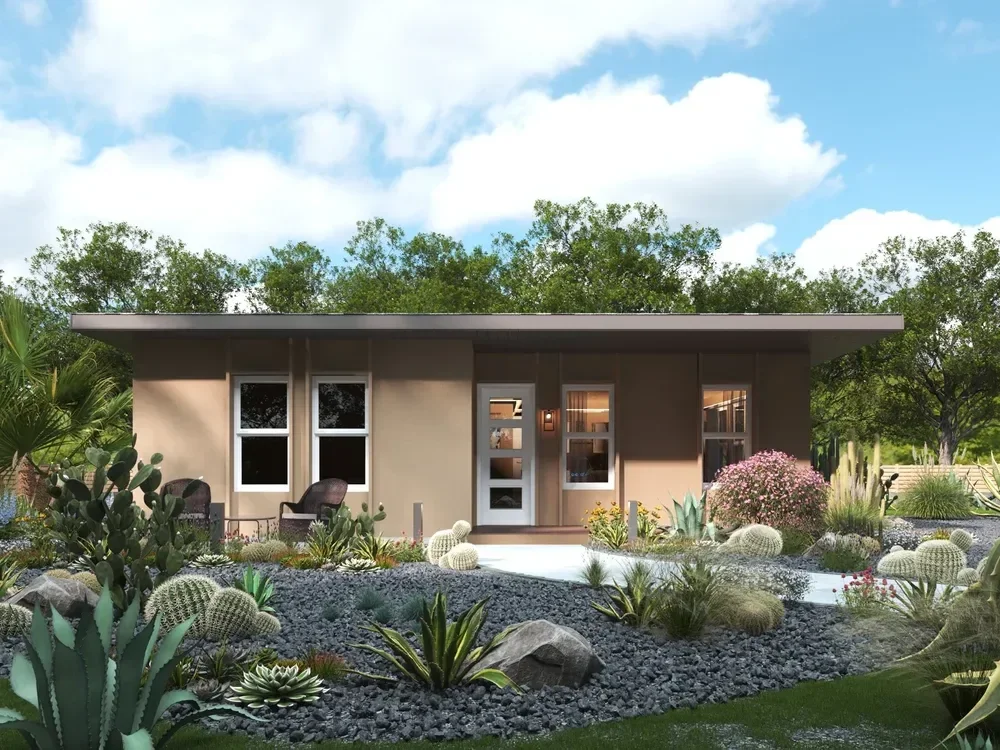 Rendering of Modern 750 sf 2 bedroom, one bath backyard ADU with minimalistic landscaping featuring various succulents and desert plants, including cacti, agave, and ornamental grasses; clear sky in the background.