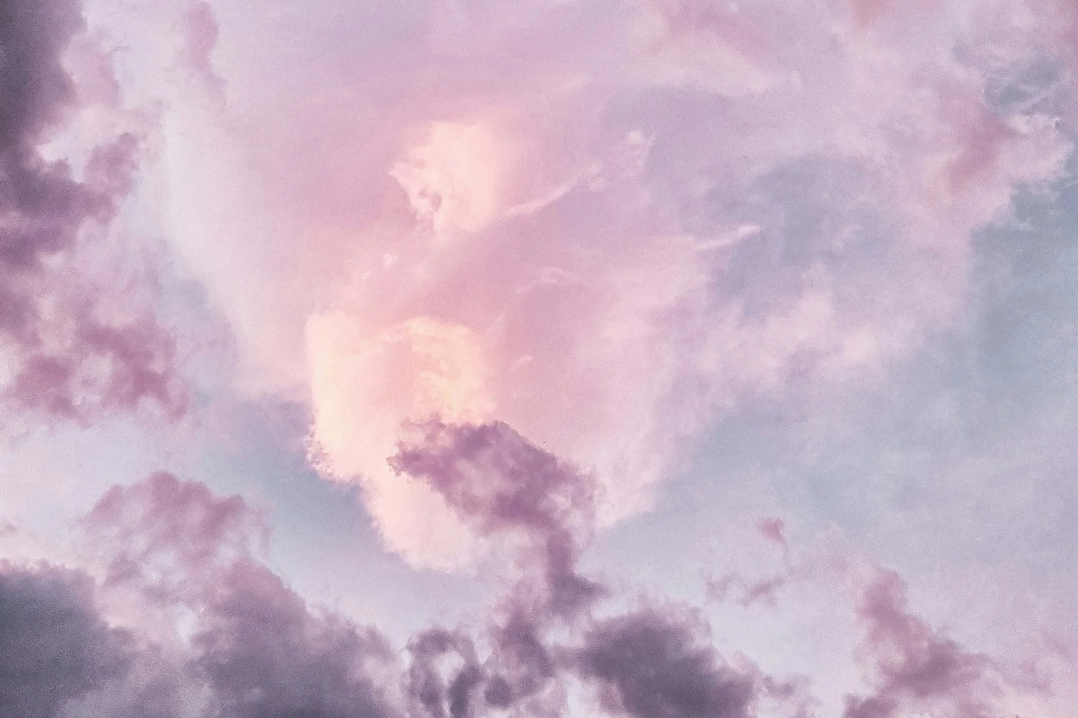 Cloudy sky with pink and purple hues
