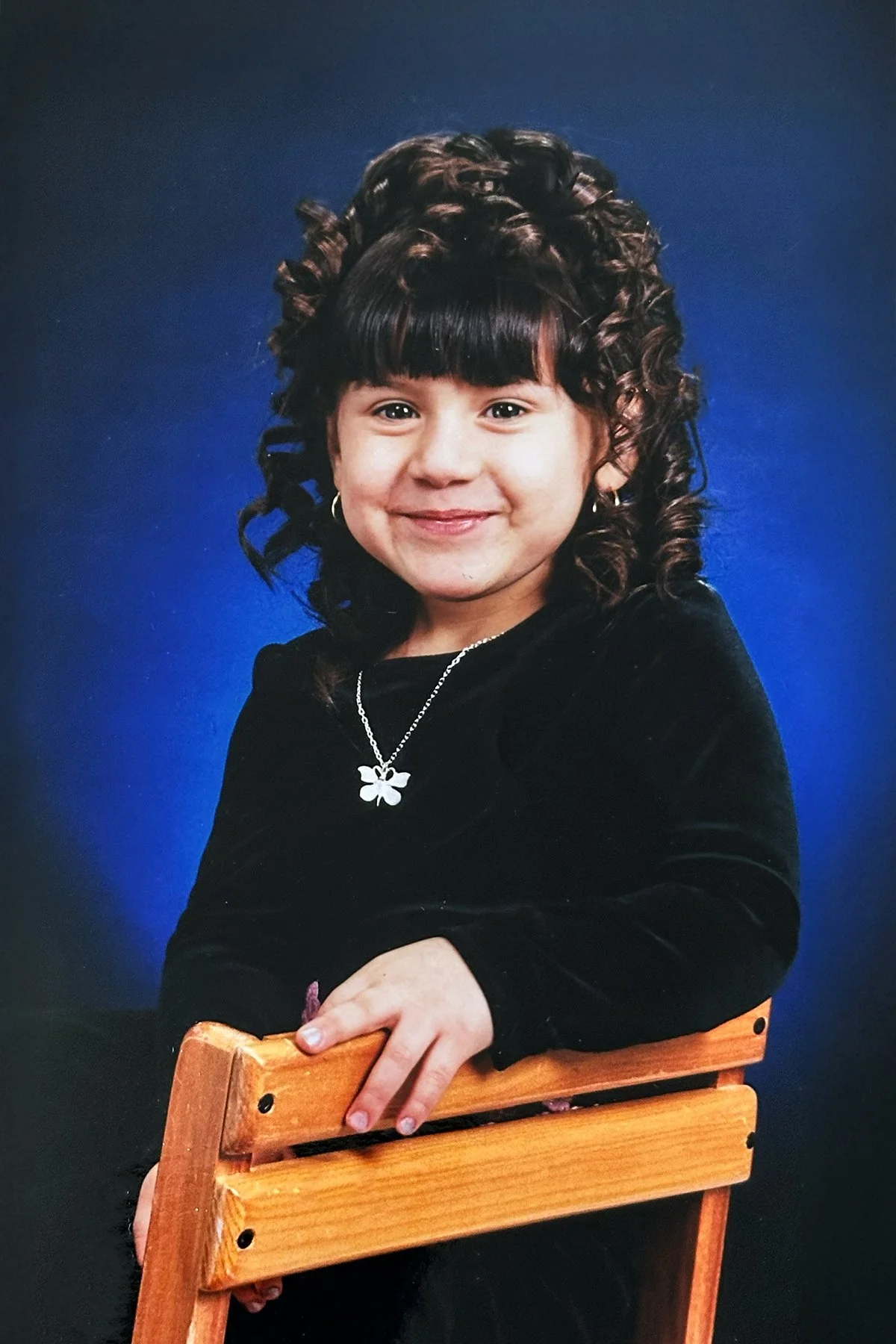 Vintage childhood studio portrait that inspired the artistic style behind Little & Loyal Studio.