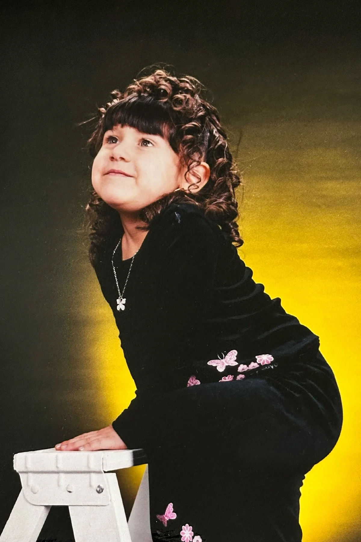 Childhood studio portrait with colorful lighting that inspired a lifelong love for portrait photography.