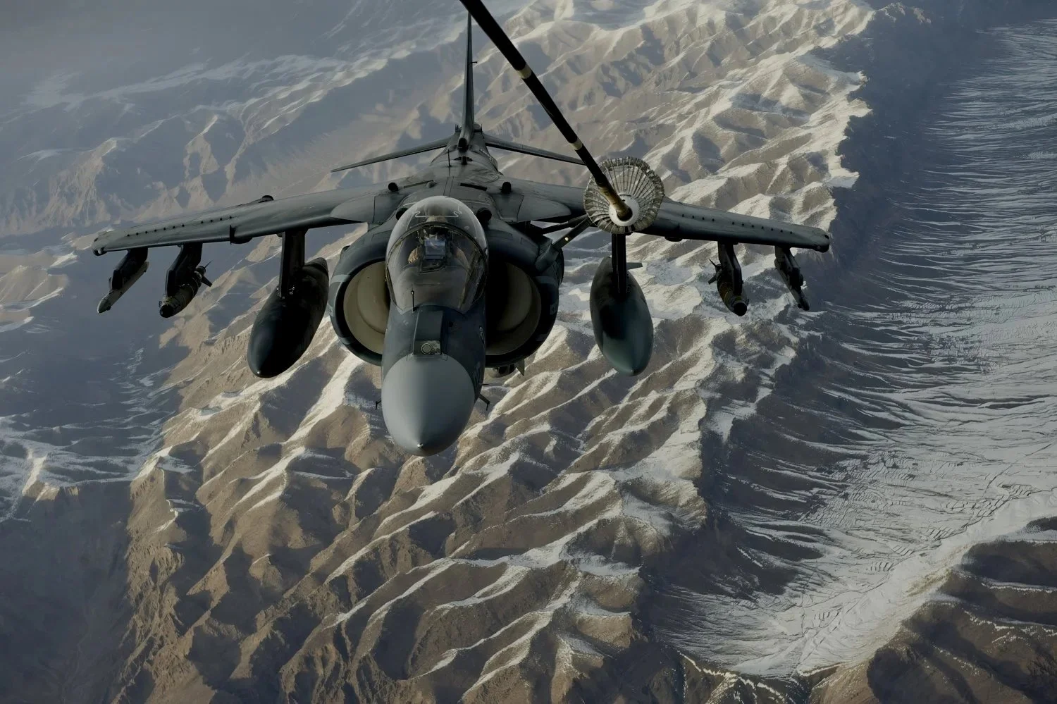 a-us-marine-corps-av-8b-harrier-receives-fuel-over-6d19a2tpz.jpg