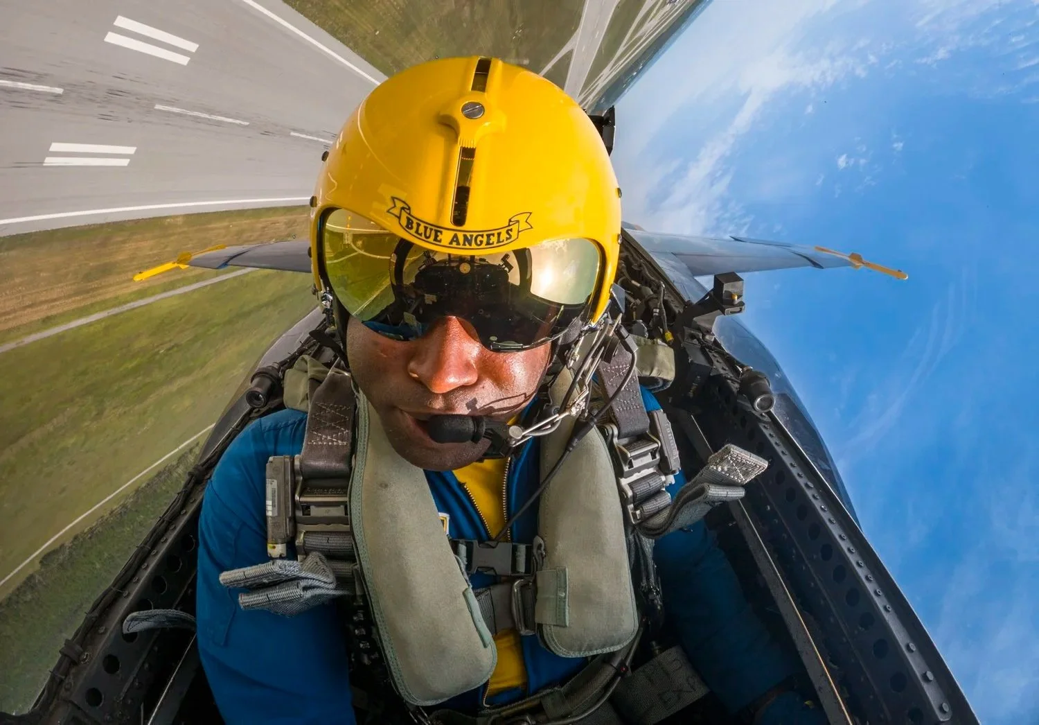 2023 Blue Angels lead solo pilot Julius Bratton, callsign Whiskers, in the cockpit of an F/A-18 Hornet during a high-speed pass