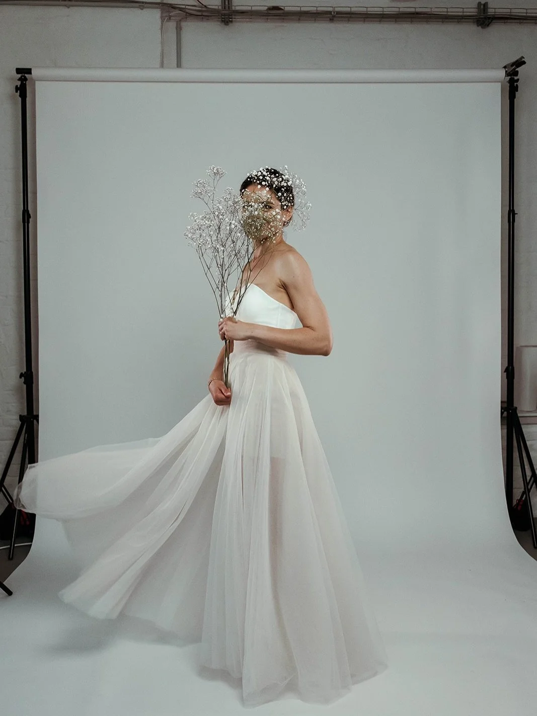 Introducing 

▪️Vibrant Tulle Skirt

A light blush-toned tulle skirt crafted for the modern bride. Soft, airy, and effortlessly chic. With a short underskirt and a high side slit, it combines romantic volume with a contemporary silhouette that pairs 