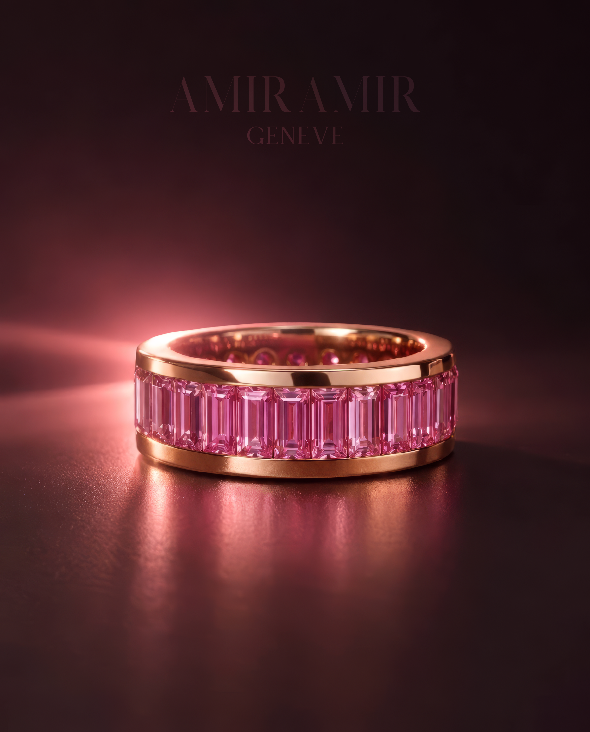 INFINÉ pink sapphire eternity ring in rose gold, showing a continuous row of natural baguette-cut pink sapphires under warm studio light.