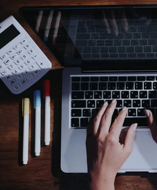 Image: Hands on laptop
