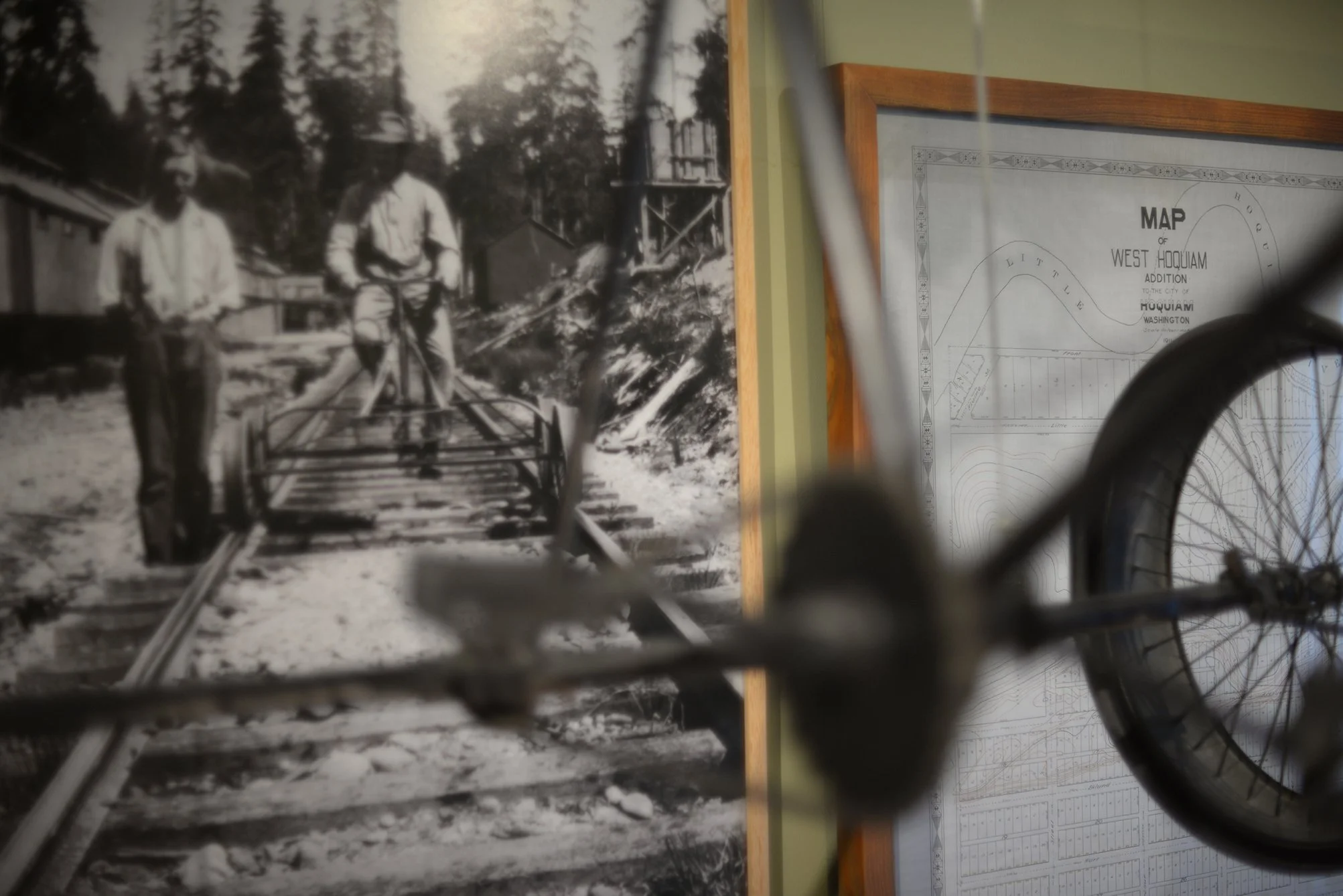 The main stairwell features gems like this Polson Logging Co. railroad track cycle
