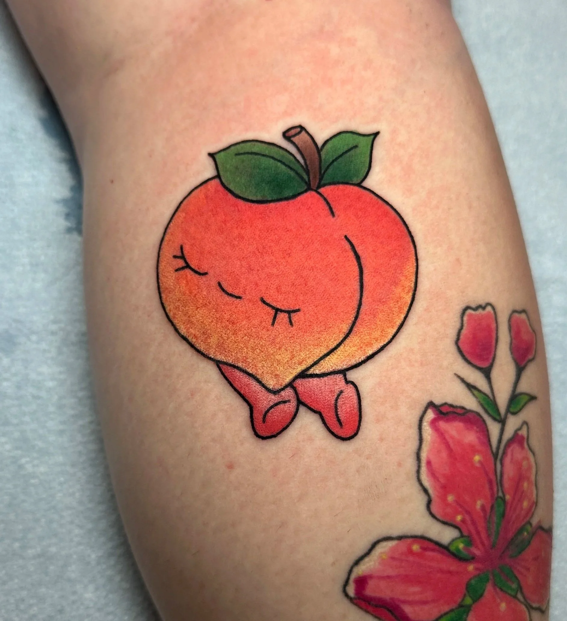 Color tattoos by female tattoo artist Kristine Tran in North Park