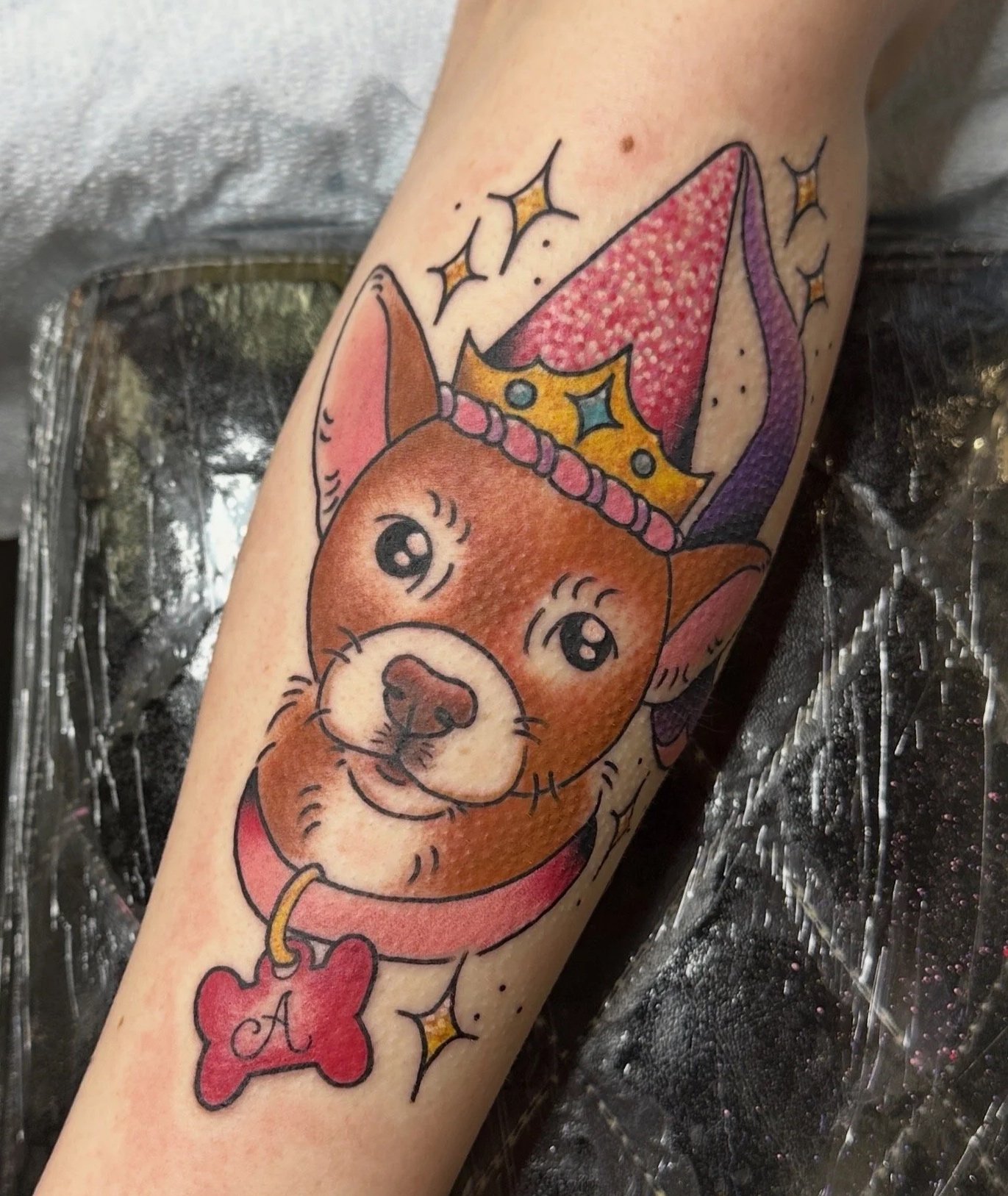 Dog portrait tattoo by Kristine Tran woman tattoo artist in North Park