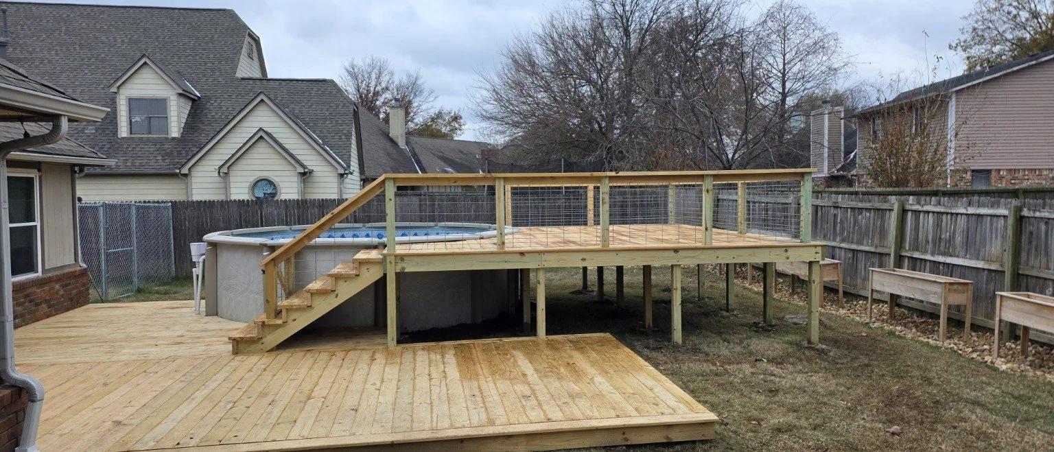 Custom multilevel wood deck with railing