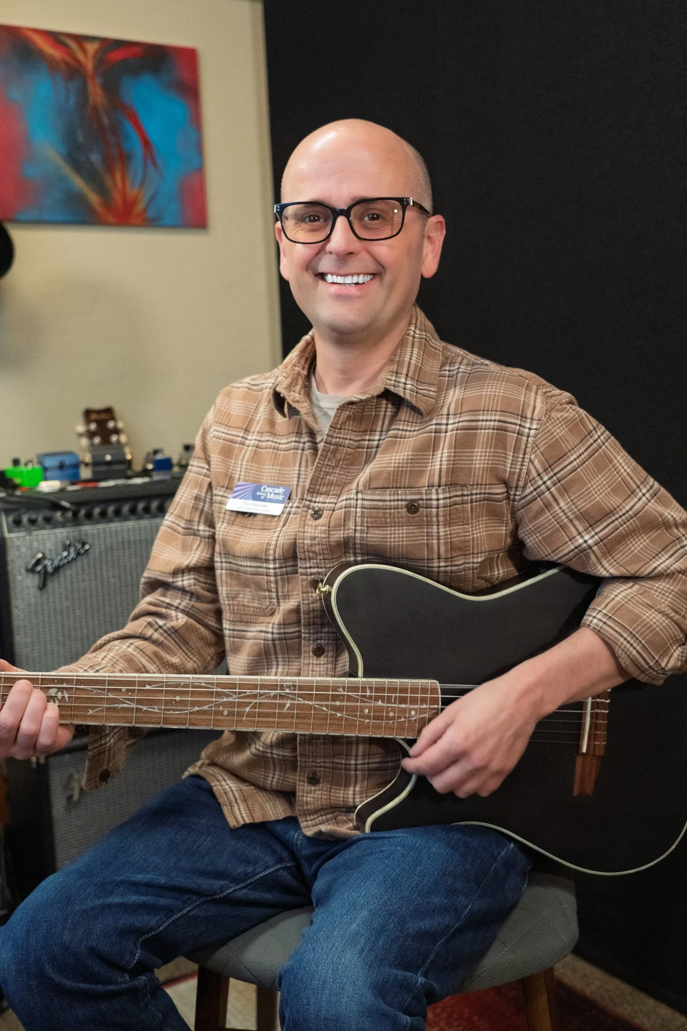 photo of Pat Pearsall with guitar