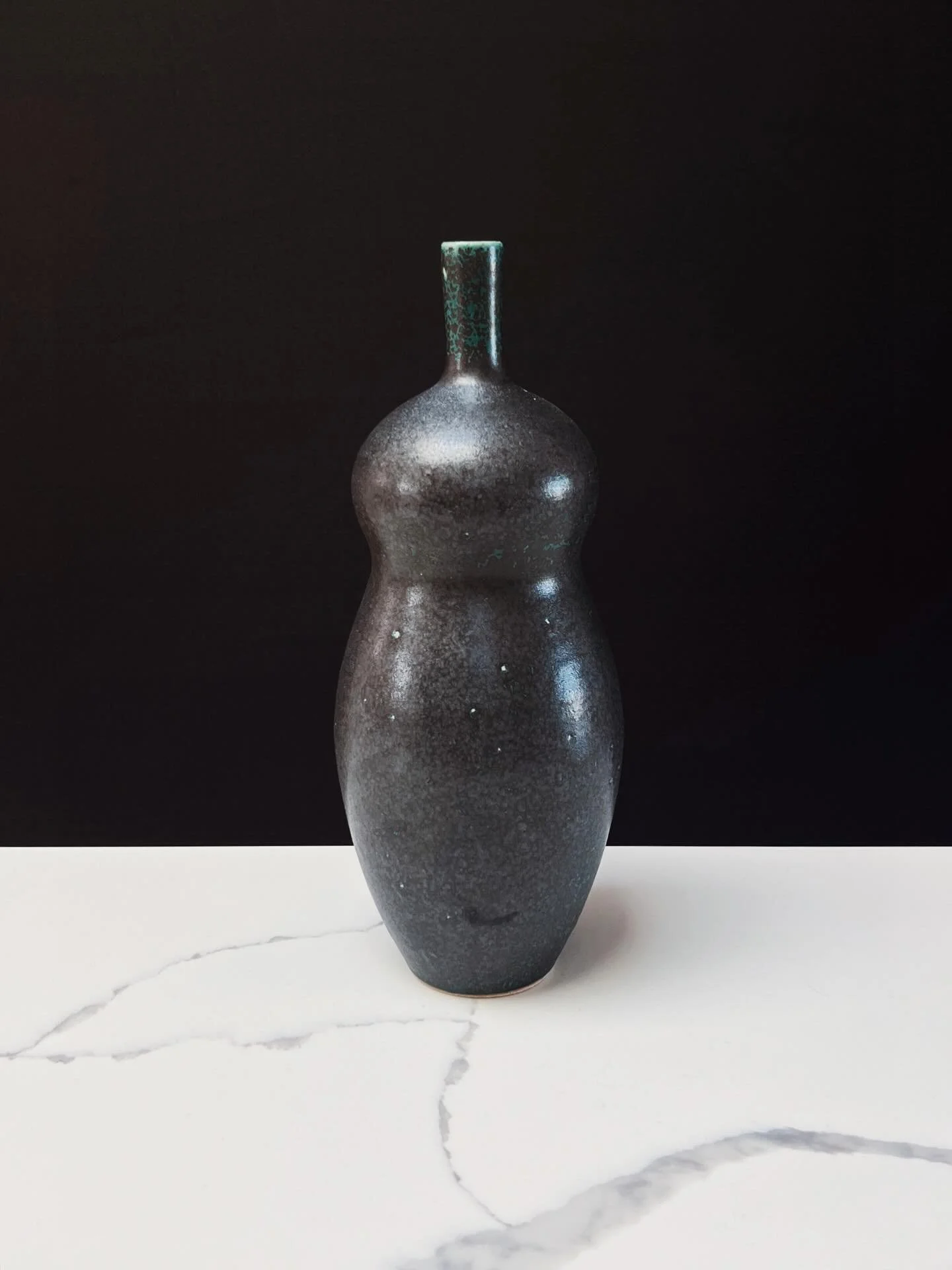 10&rdquo;H, stoneware

Looong gourd. Will be sold as a second!