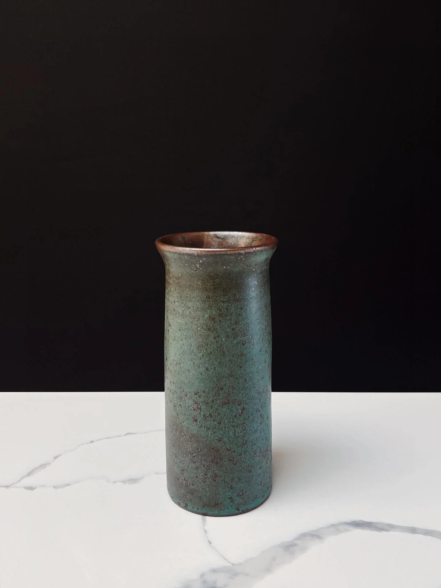 8&rdquo;H, stoneware, reitz green

Held onto this simple vase for a while, but it&rsquo;s time to let it go!