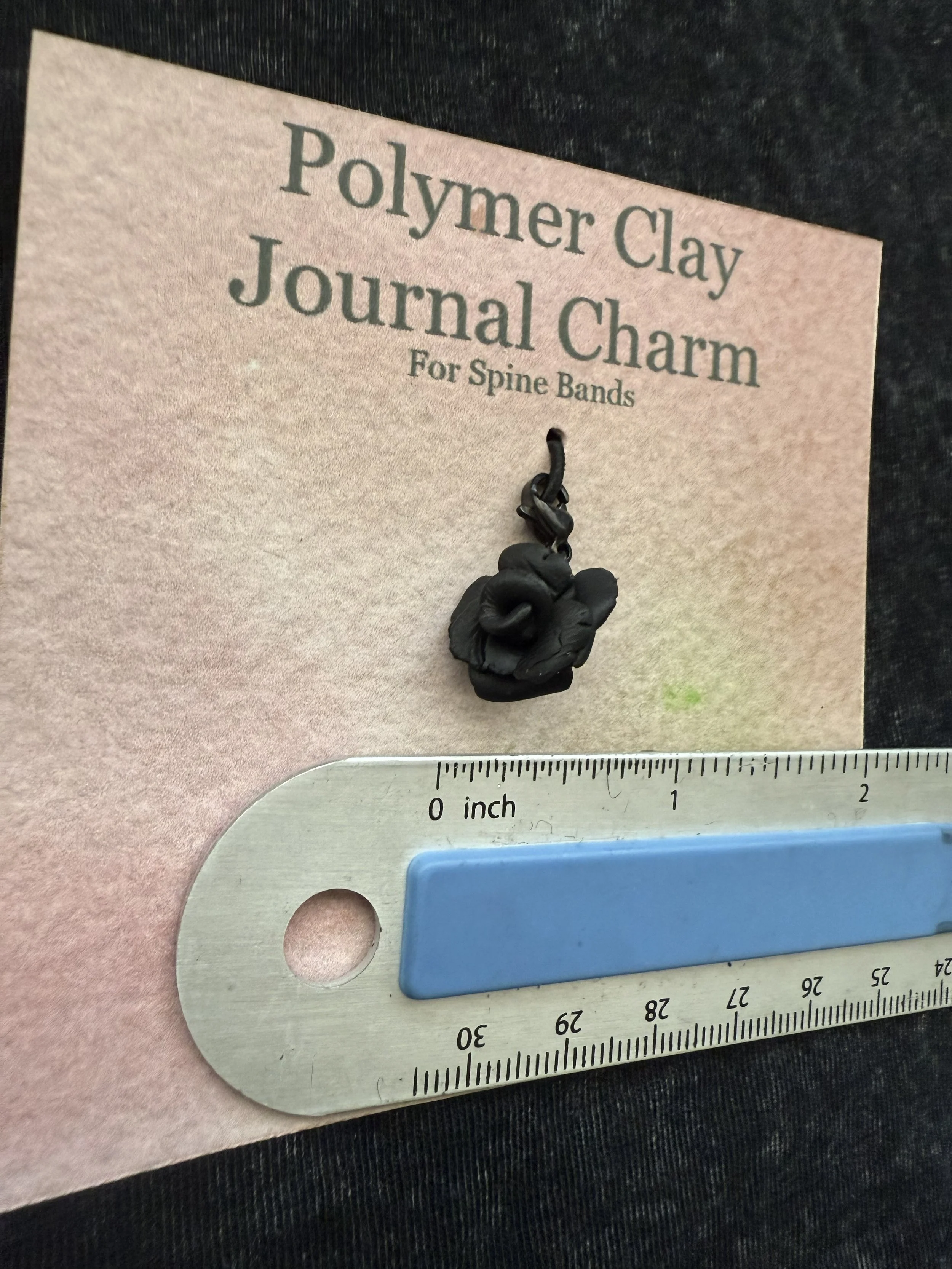black rose spine charm angle.jpeg