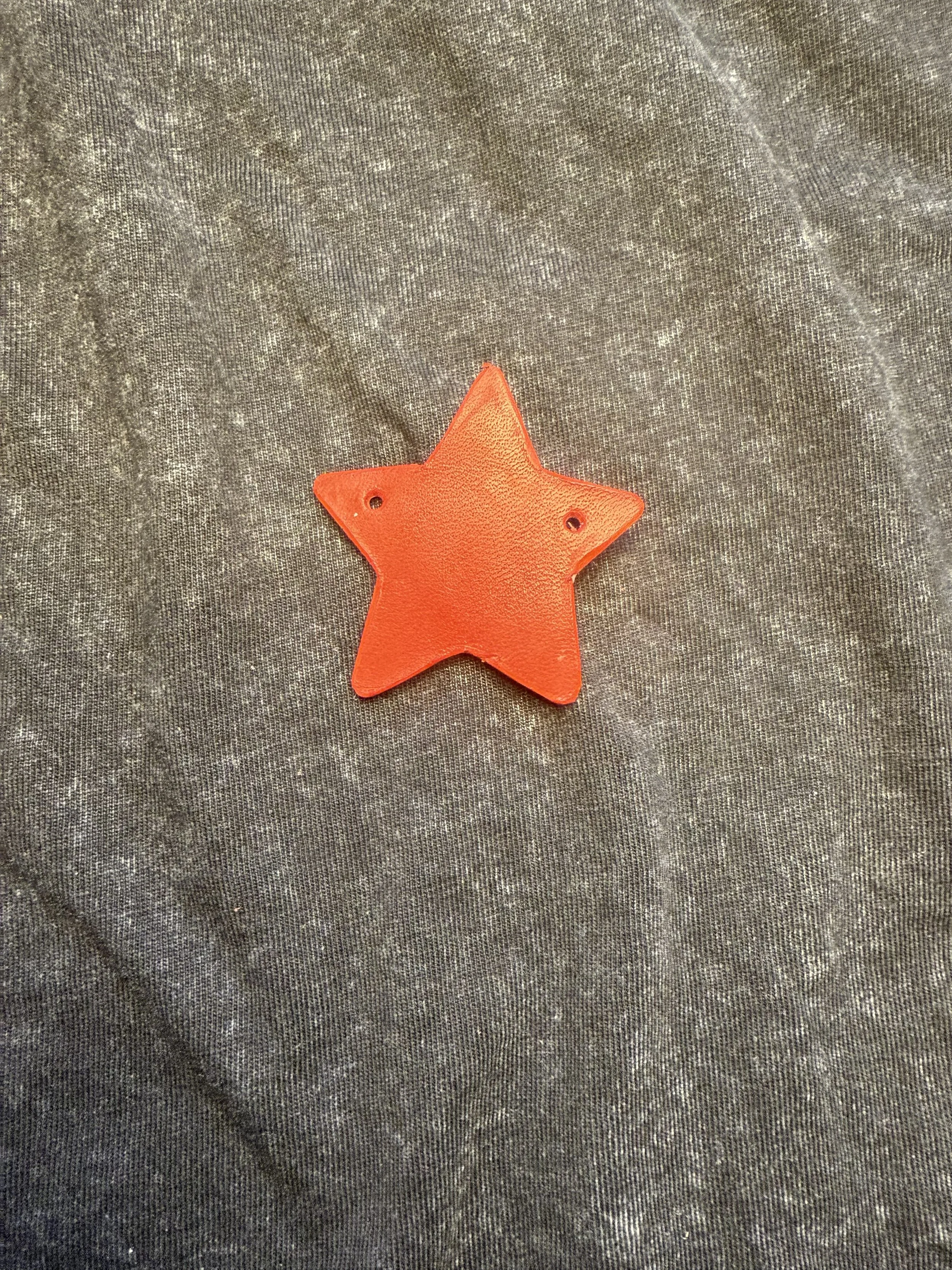 red star leather charm.jpeg