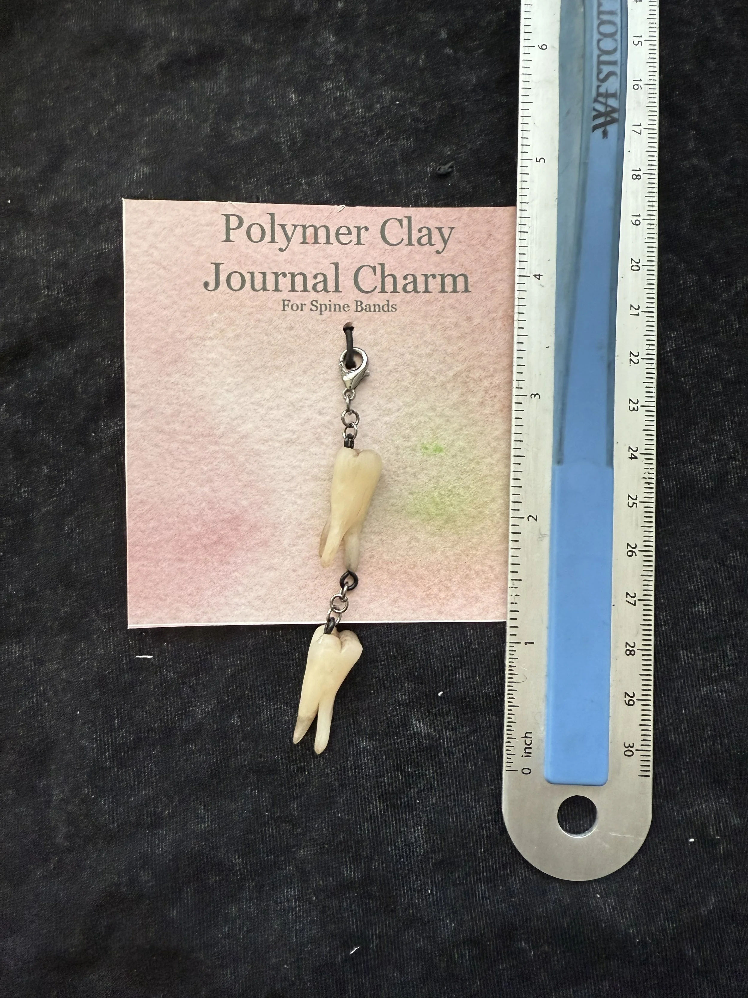 double tooth charm.jpeg