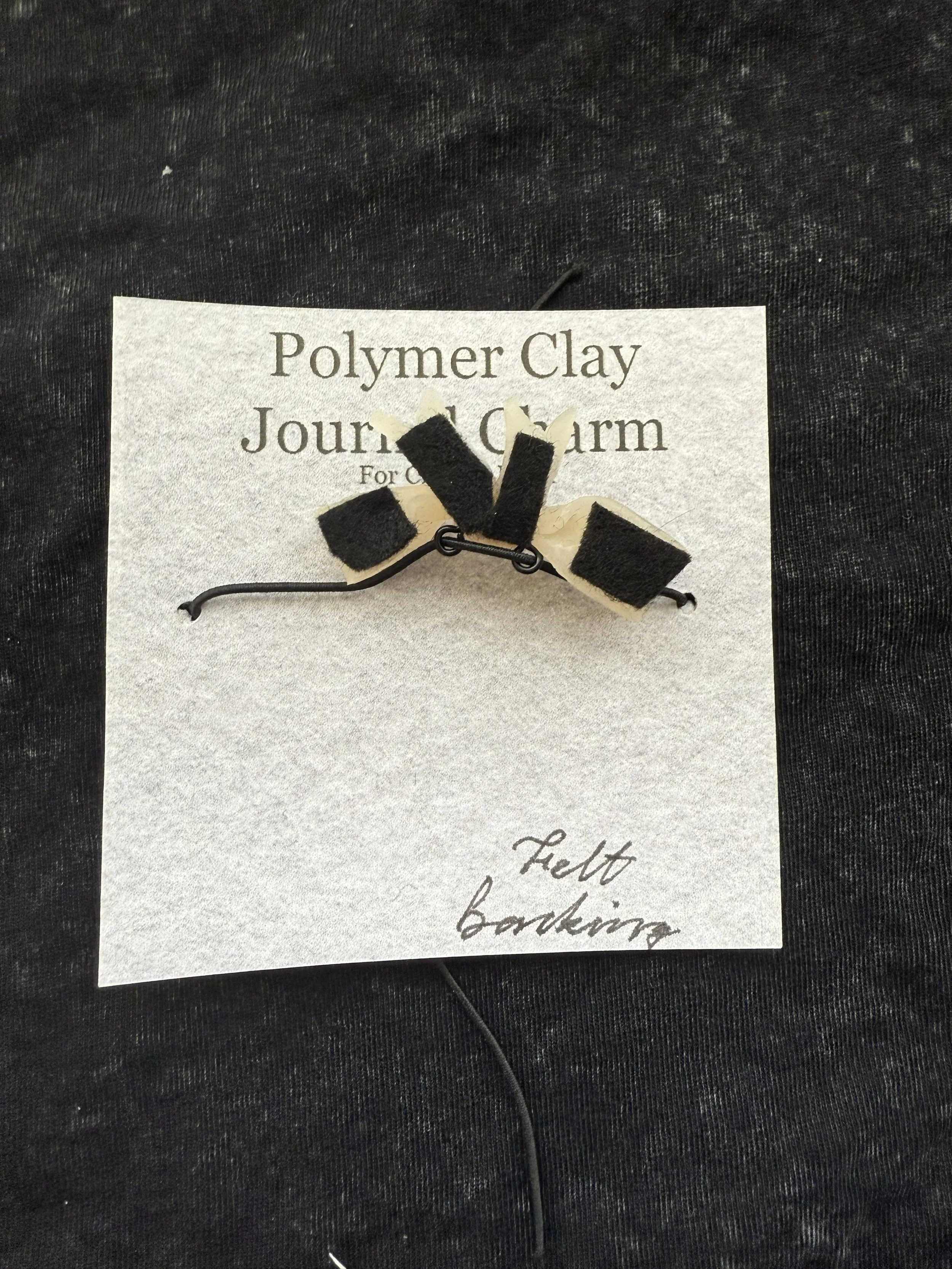 white bow charm 2 back.jpeg
