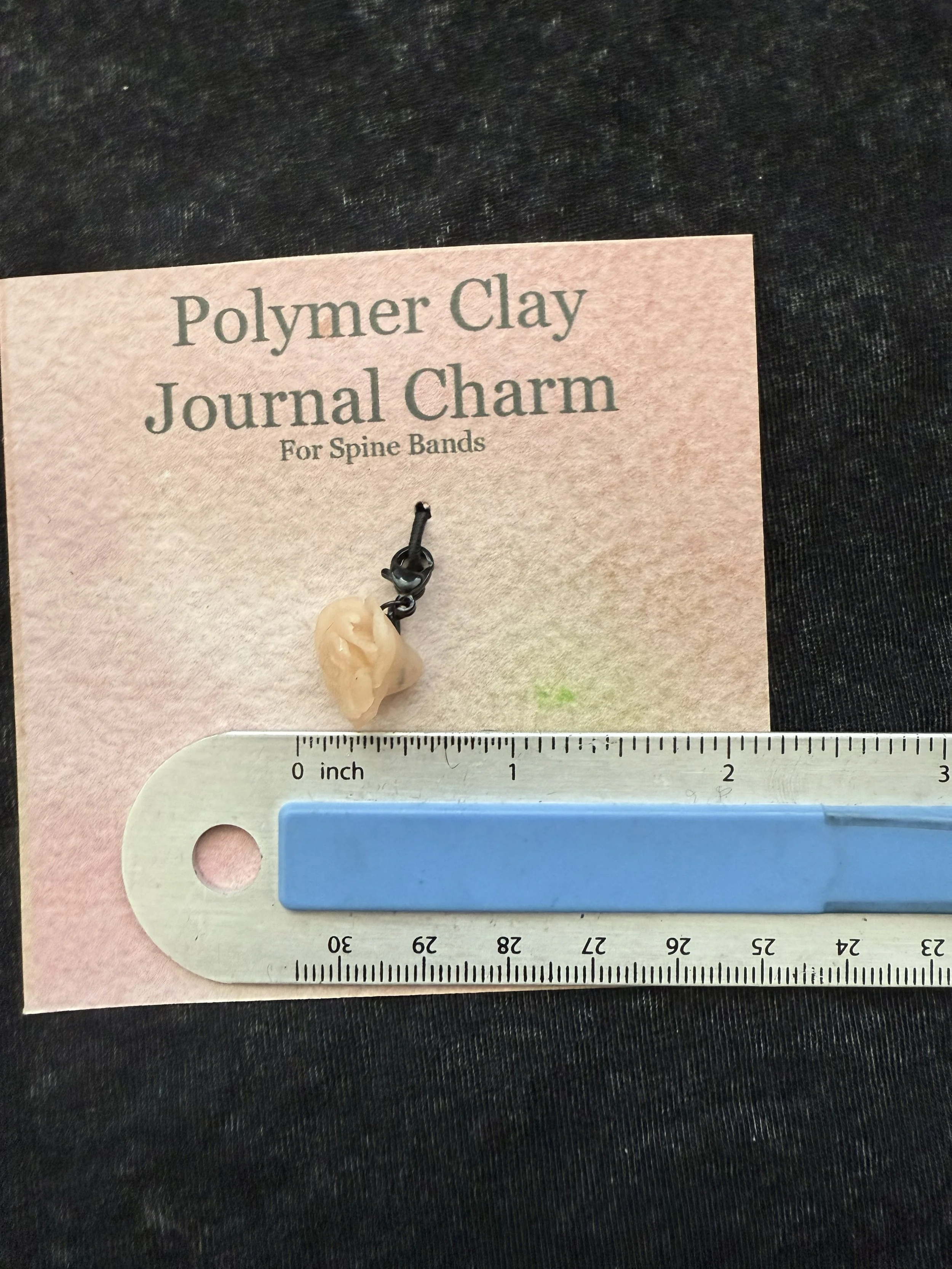 pink rose spine charm.jpeg