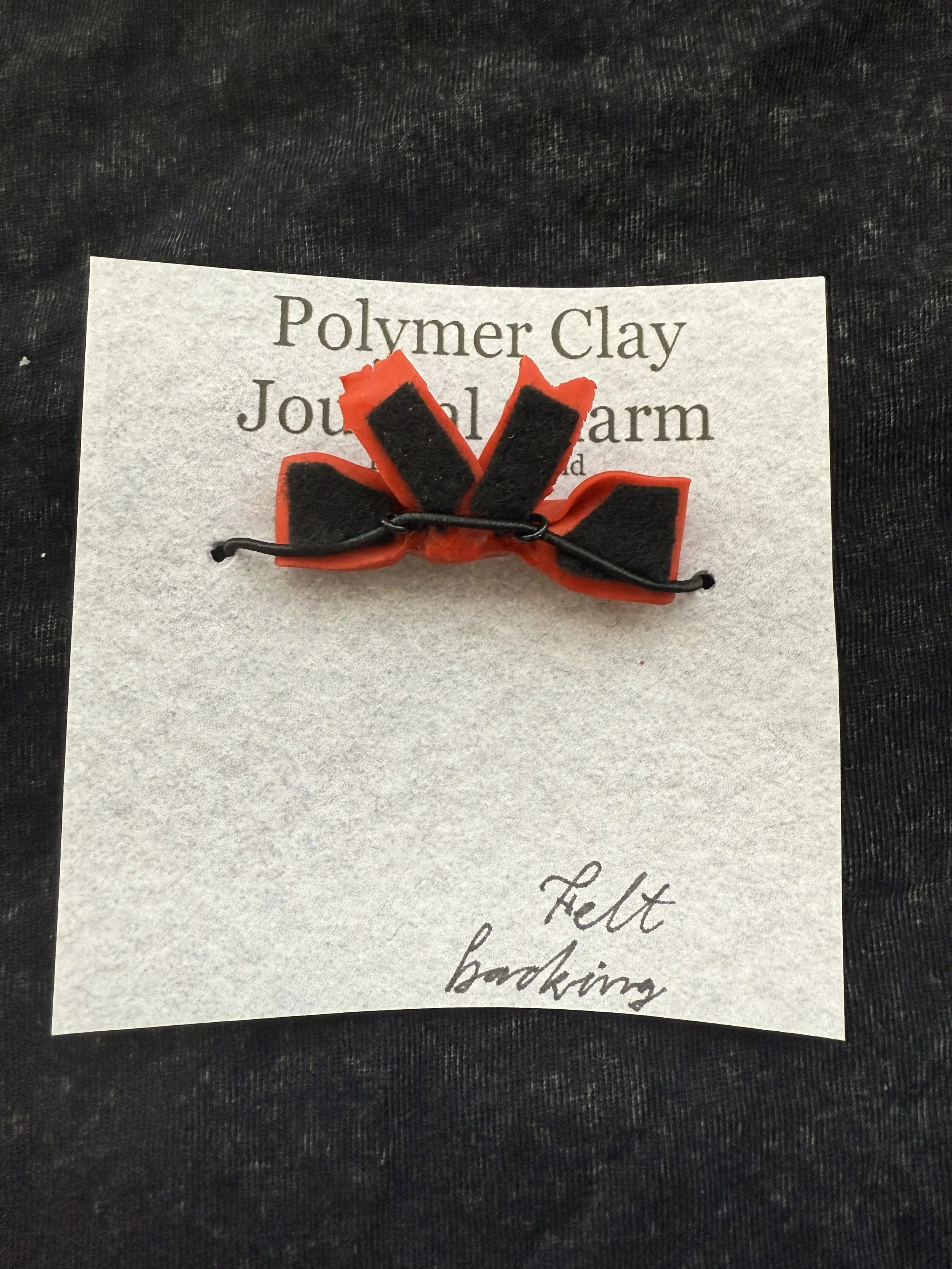 red bow charm 2 back.jpeg