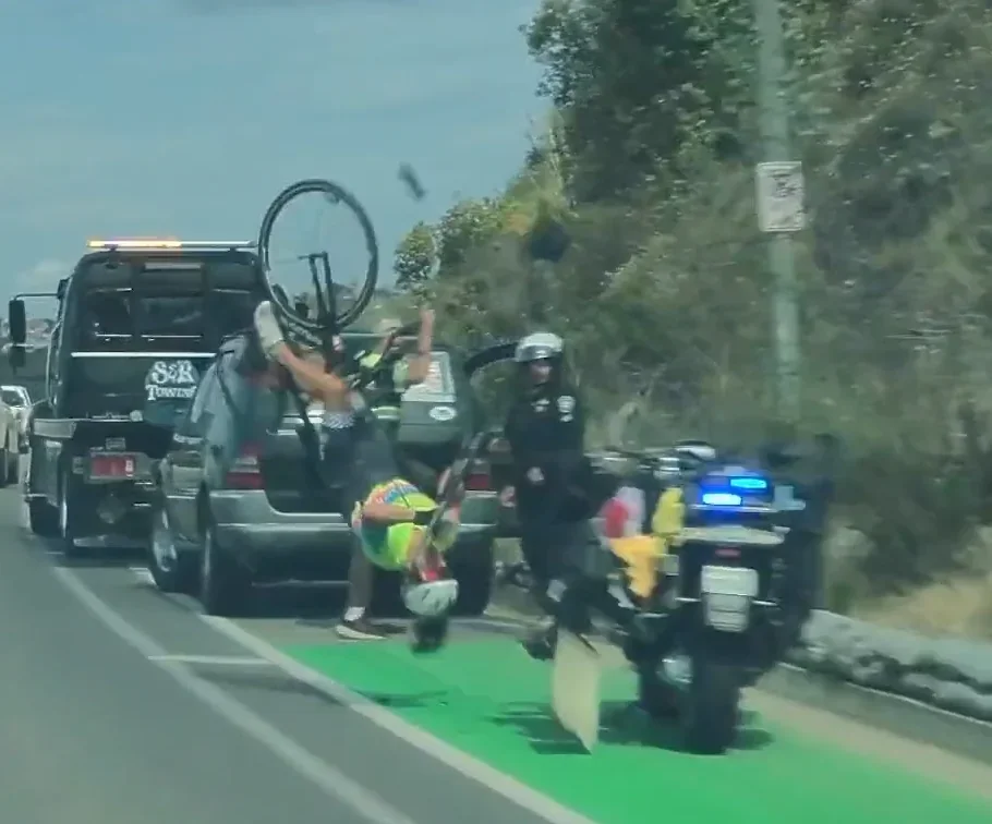 Dash-cam: Bicycle collides with police motorcycle in Carlsbad (CBS8)