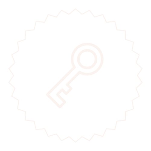 White key icon inside a starburst shape on a black background.