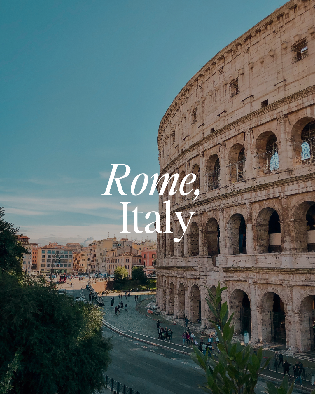Photo of the Colosseum in Rome, Italy, with people walking nearby under a clear blue sky.