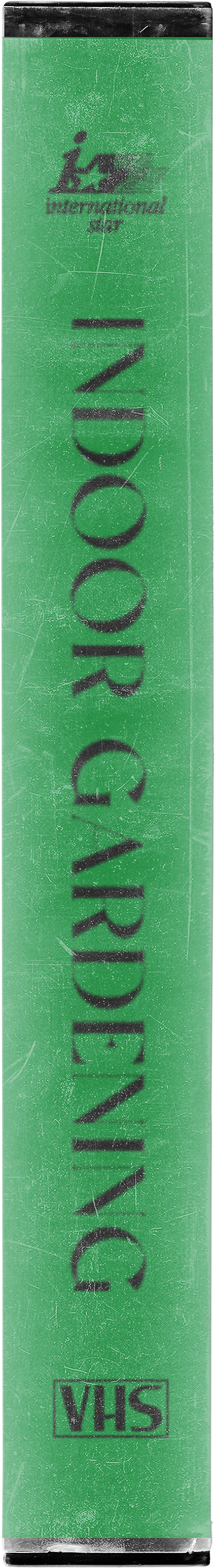 Green VHS tape with black printed text that reads 'Indoor Gardening' and a logo for 'International Star' at the top.