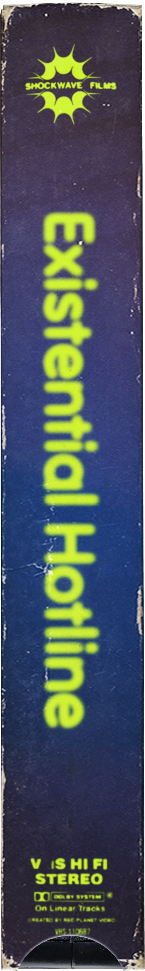 Vertical cassette tape box with Shock Wave Films logo at the top and the title 'Existential Hotline' in large glowing green text down the side.