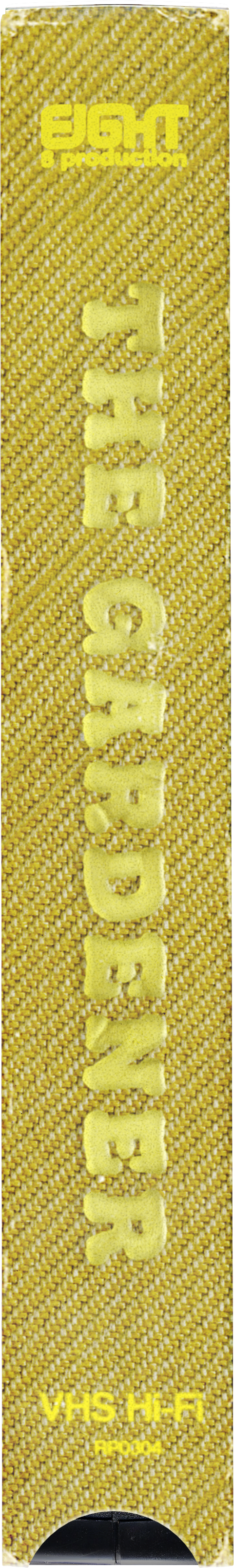 Close-up of yellow fabric material with embroidered yellow text that reads 'THE GARDENER' vertically, and additional smaller yellow text that says 'EIGHT production' near the top, along with yellow embroidery of 'VHS' and 'PROD' near the bottom.