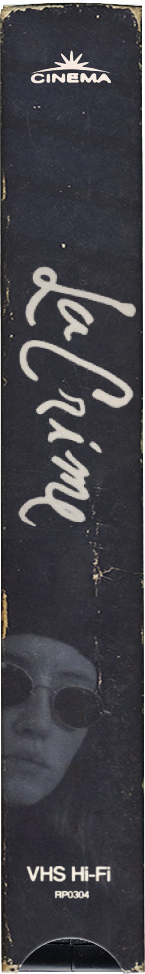 A vintage VHS tape with the label 'La Crime' featuring a woman's face wearing sunglasses and the word 'CINEMA' at the top.