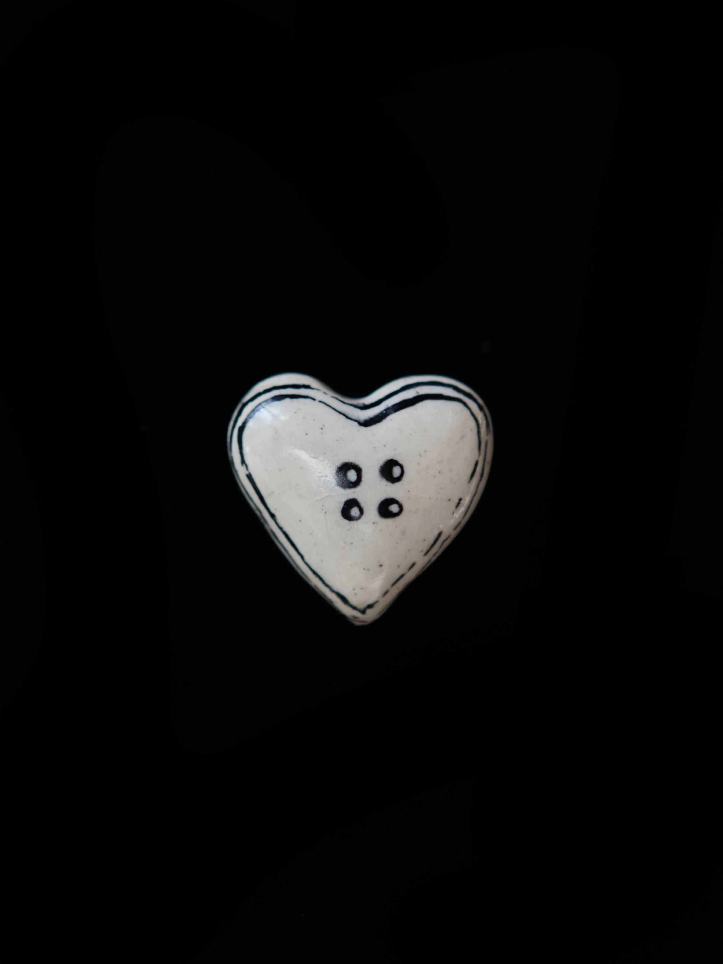 Ivory Button Heart Amulet