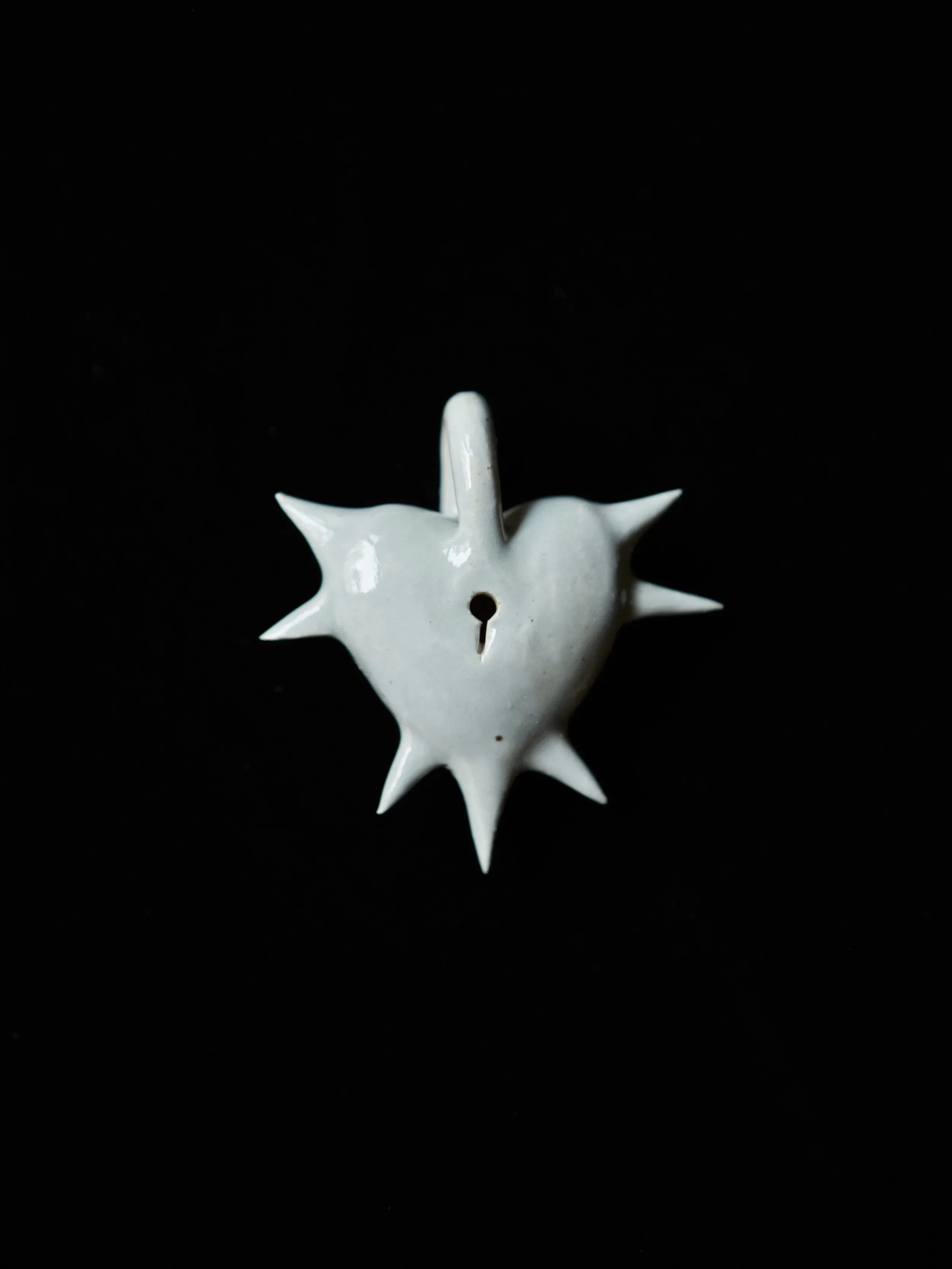 mud-bunny-spiked-heart-pendant-1.jpg