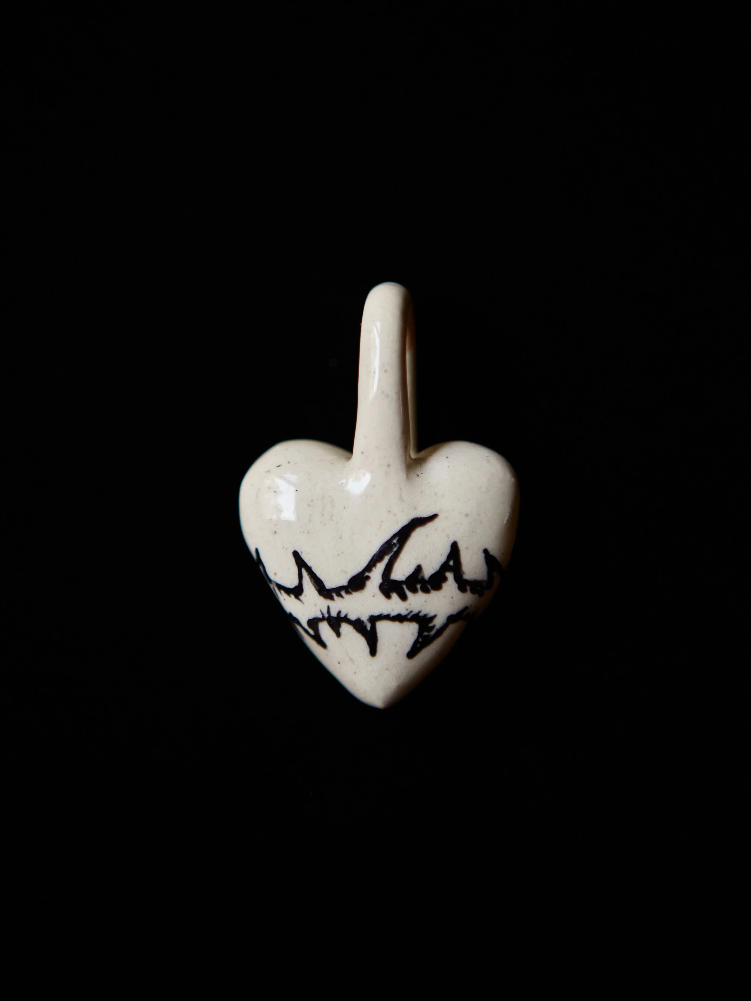 mud-bunny-spiked-heart-pendant-3.jpg