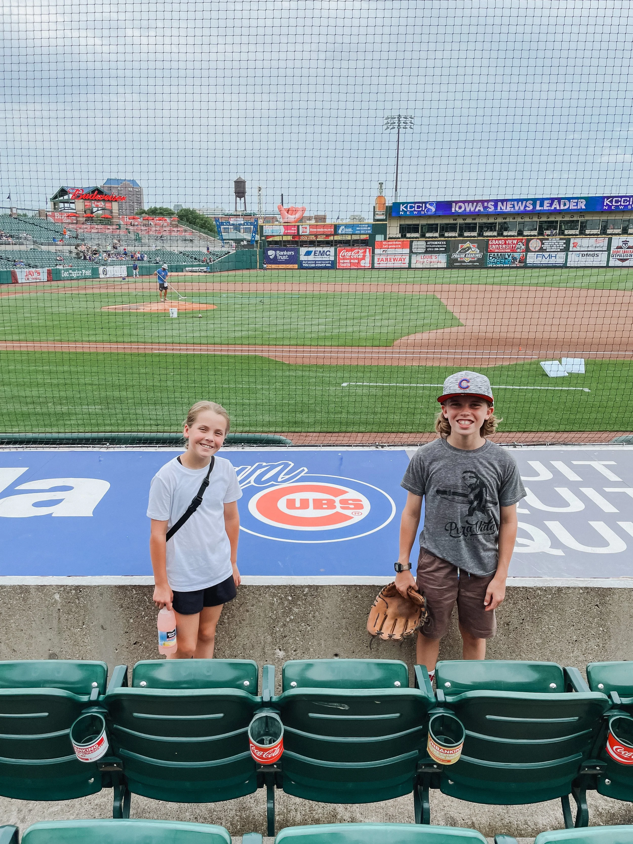 kids at Iowa Cubs baseball game