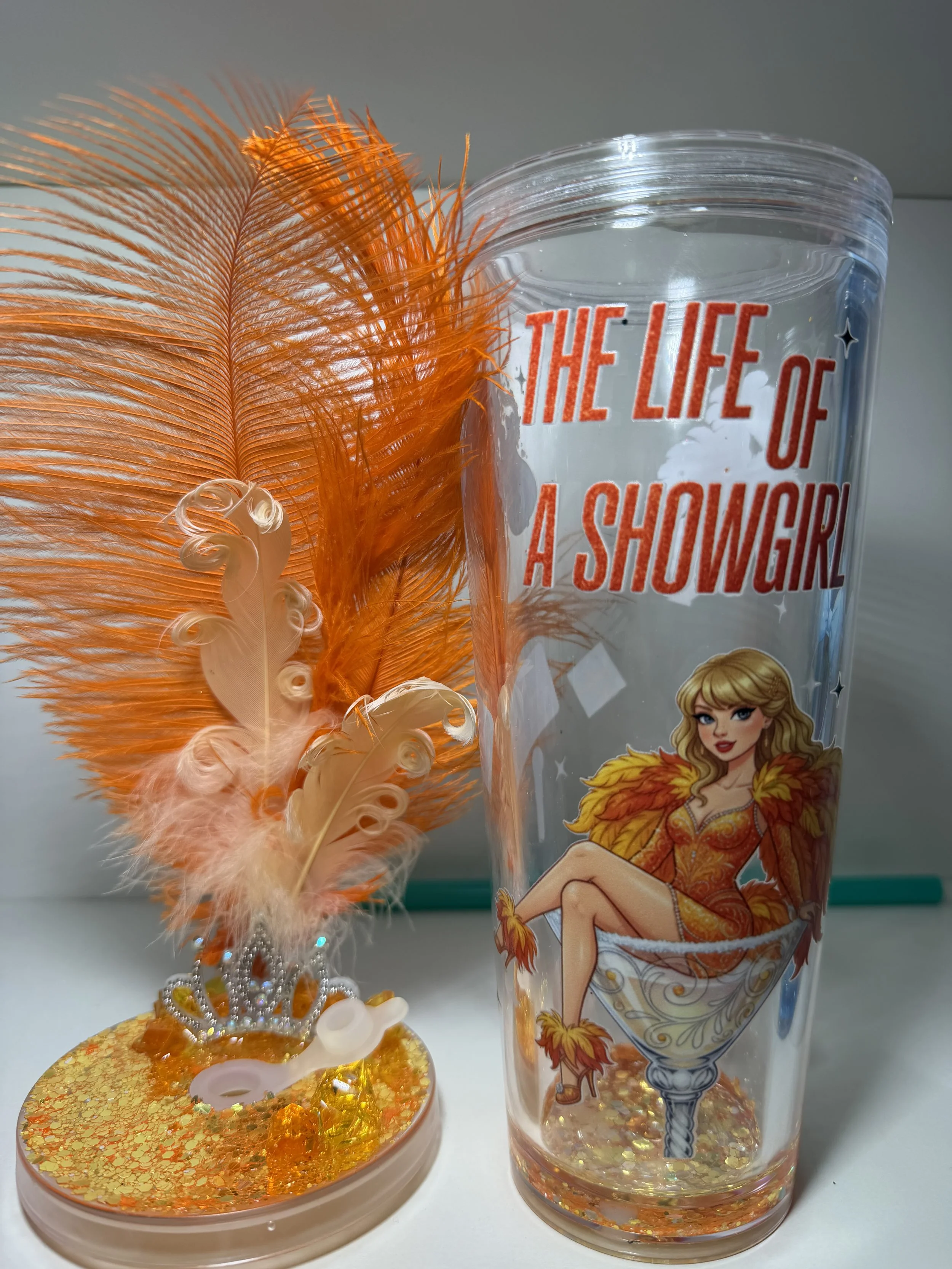 life of a showgirl - big sips orange waterfall with extravagant topper