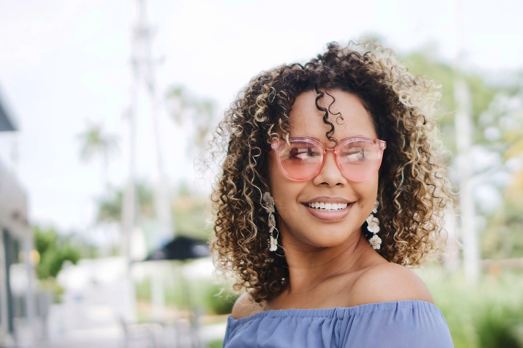 A woman smiling, reflecting the hope and healing possible after trauma therapy at Tampa EMDR.