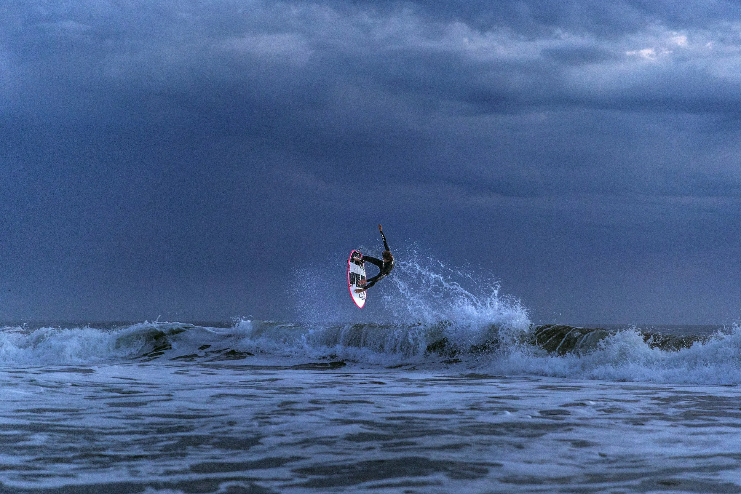 ZumaBeach_Surfer_jump copy.jpg