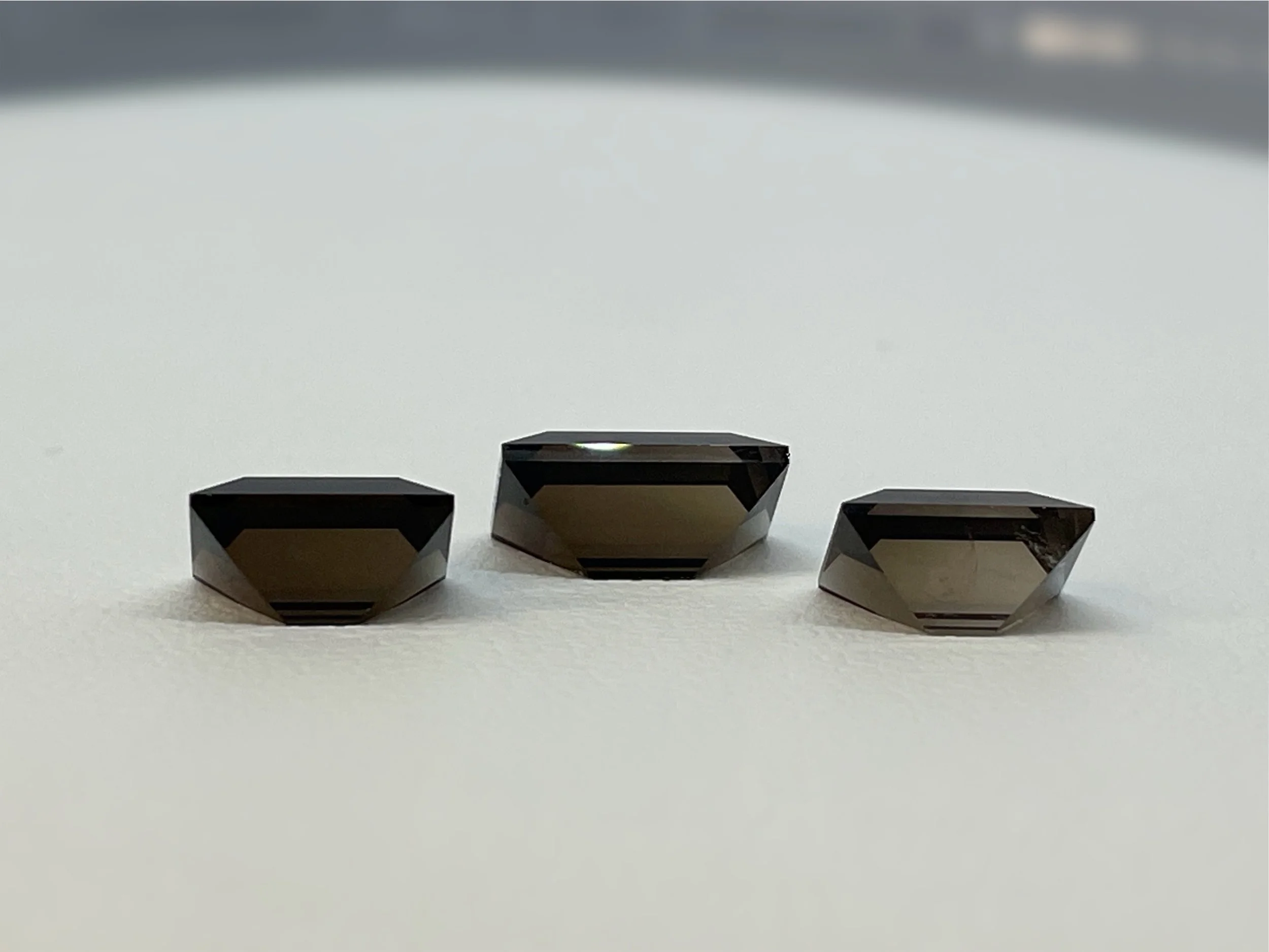 6.22 ctw Smoky Quartz Trio Pavilion.jpeg
