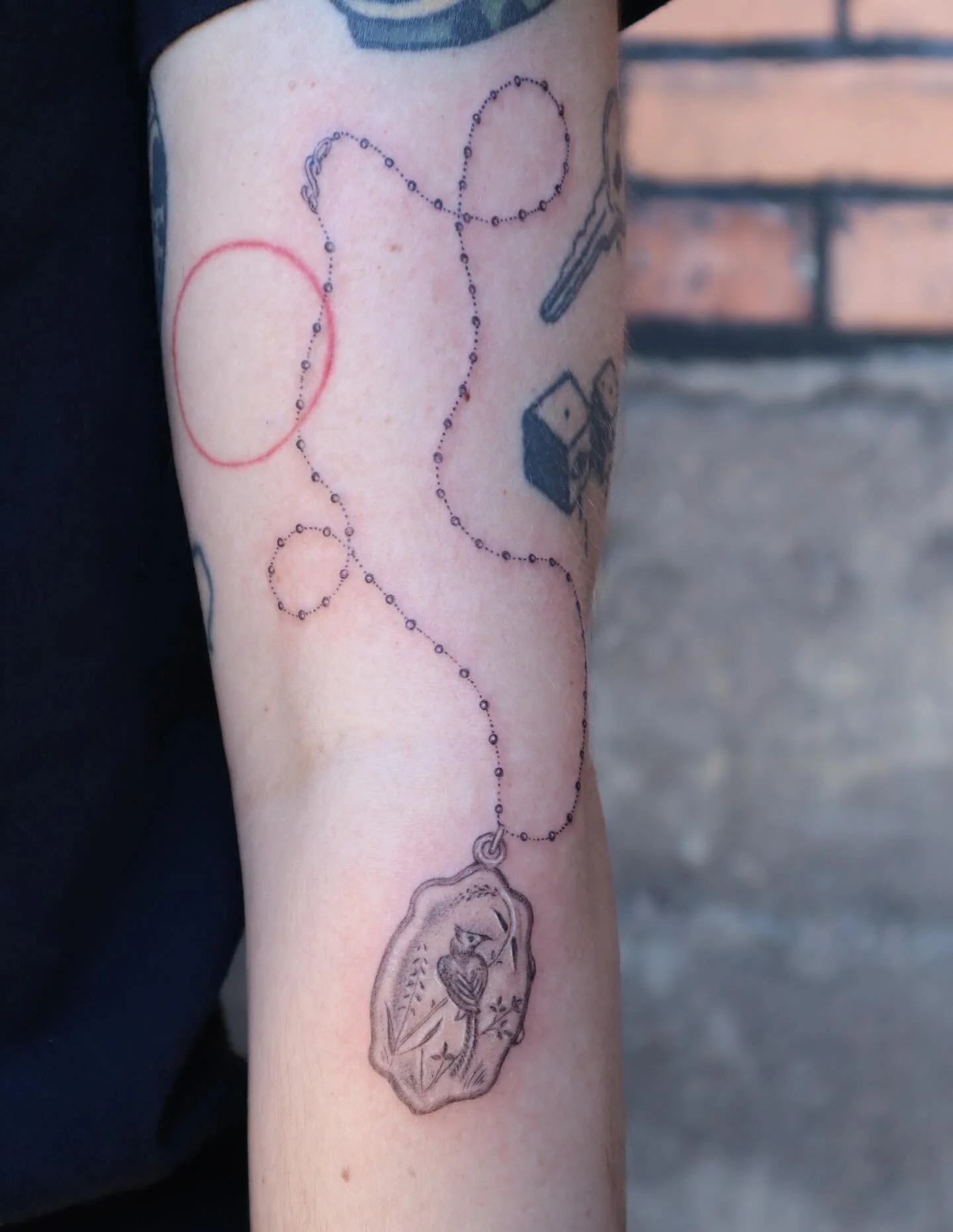 Victorian era Bird of Paradise locket with a drawn on chain for Charlie ✨