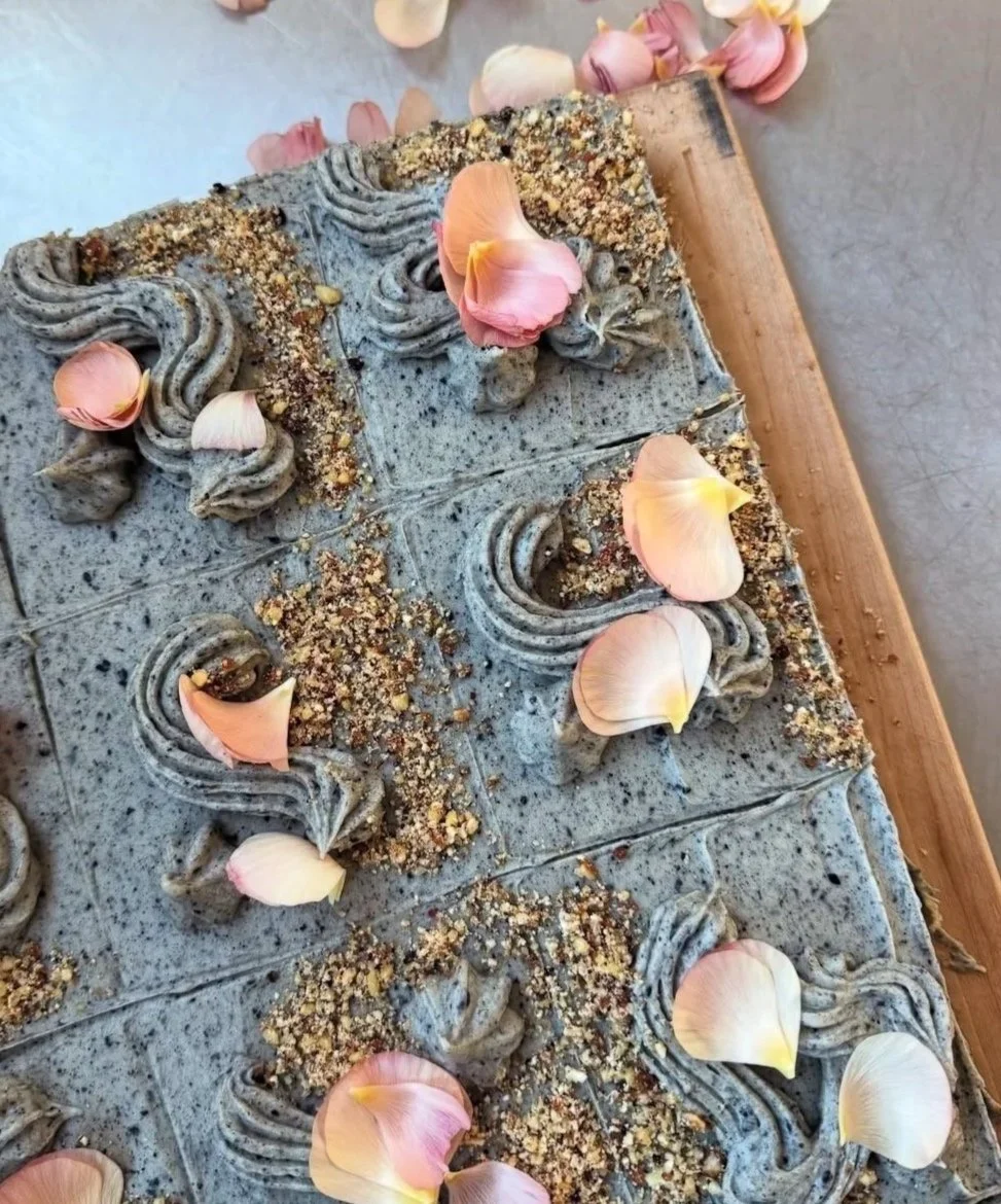 box xxi apple olive cake with black sesame buttercream