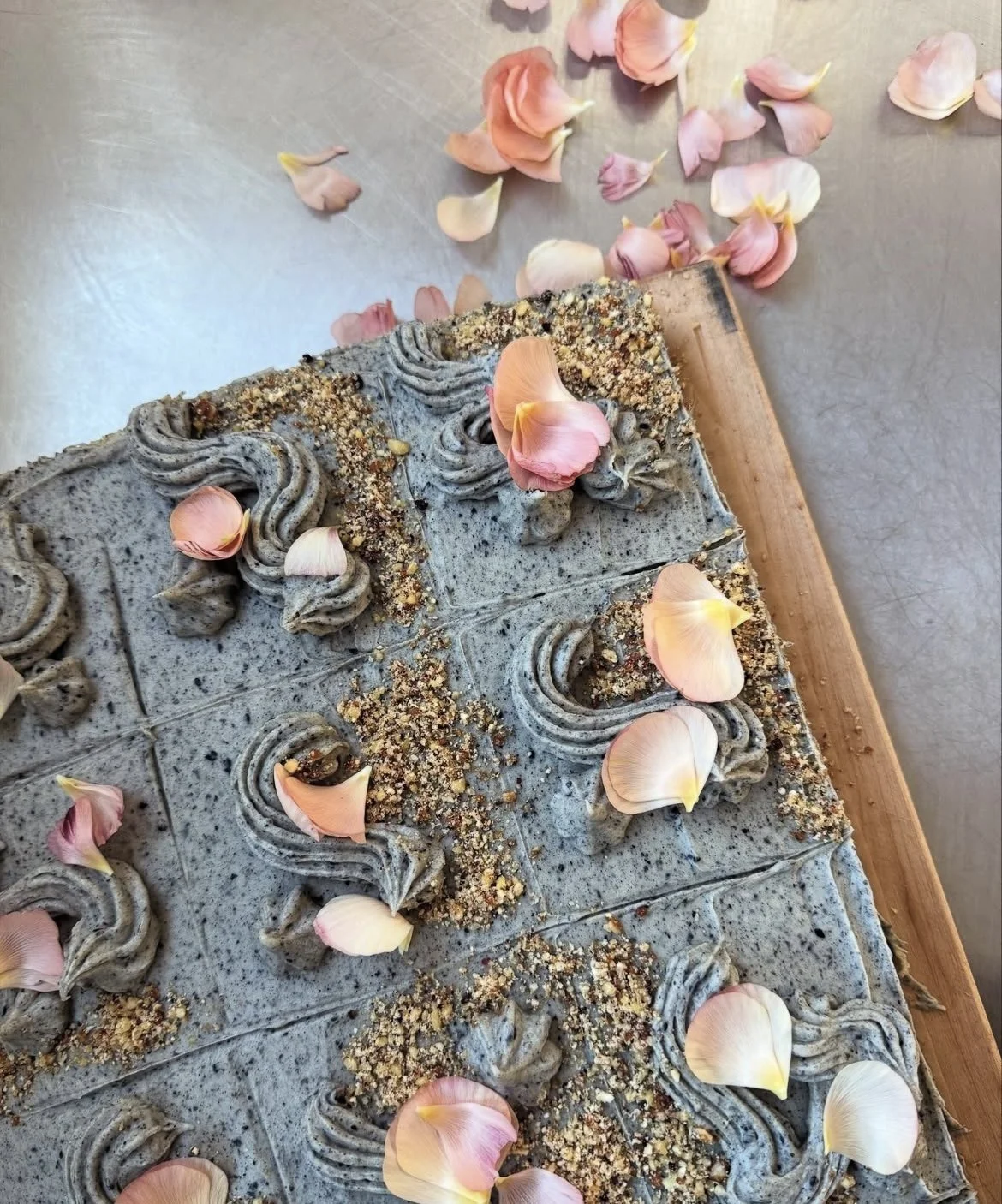 box xxi apple olive cake with black sesame buttercream