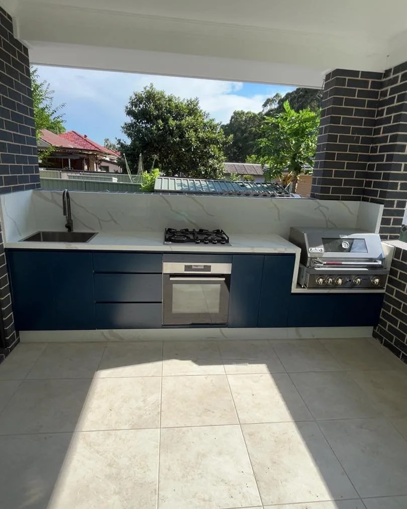 Where design meets flame 🔥 a BBQ area built for flavor and flair. Call today for your free quote!