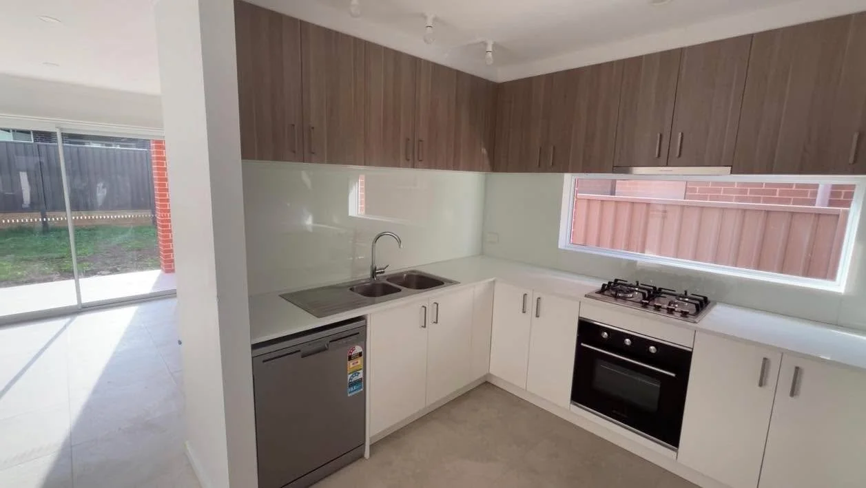 Classic white meets Maison Oak &mdash; a kitchen that never goes out of style. Contact us today to get your free quote!