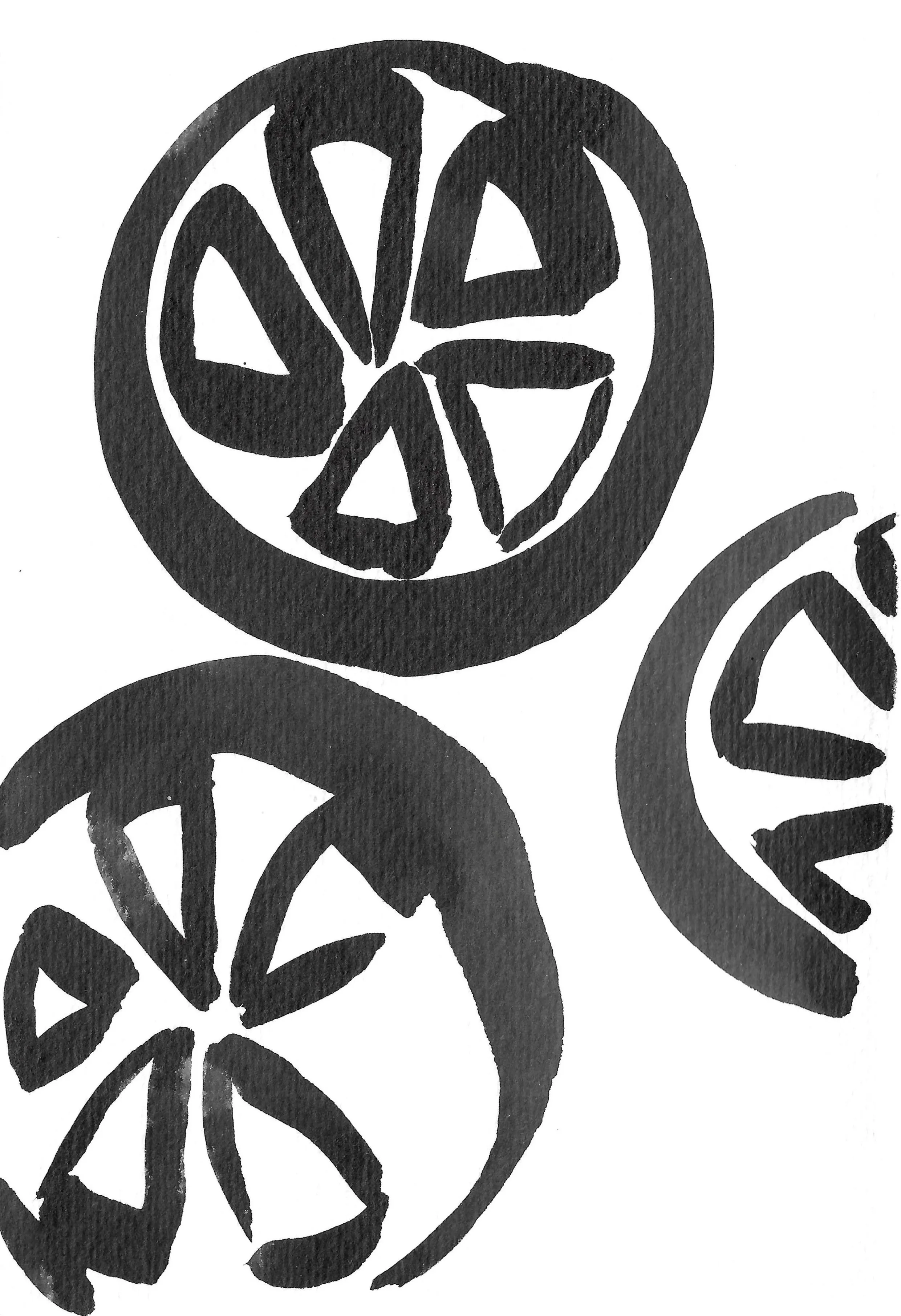 Black and white watercolor illustration of citrus slices, with three full slices and one half slice.