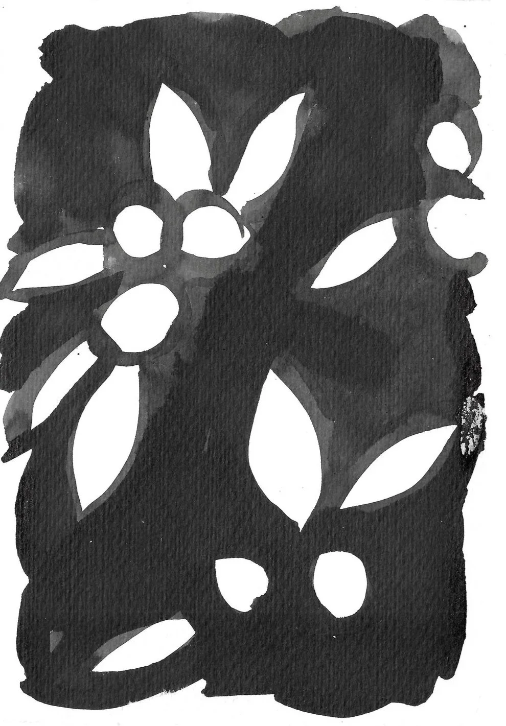 Black and white floral stencil with leaves and berries.