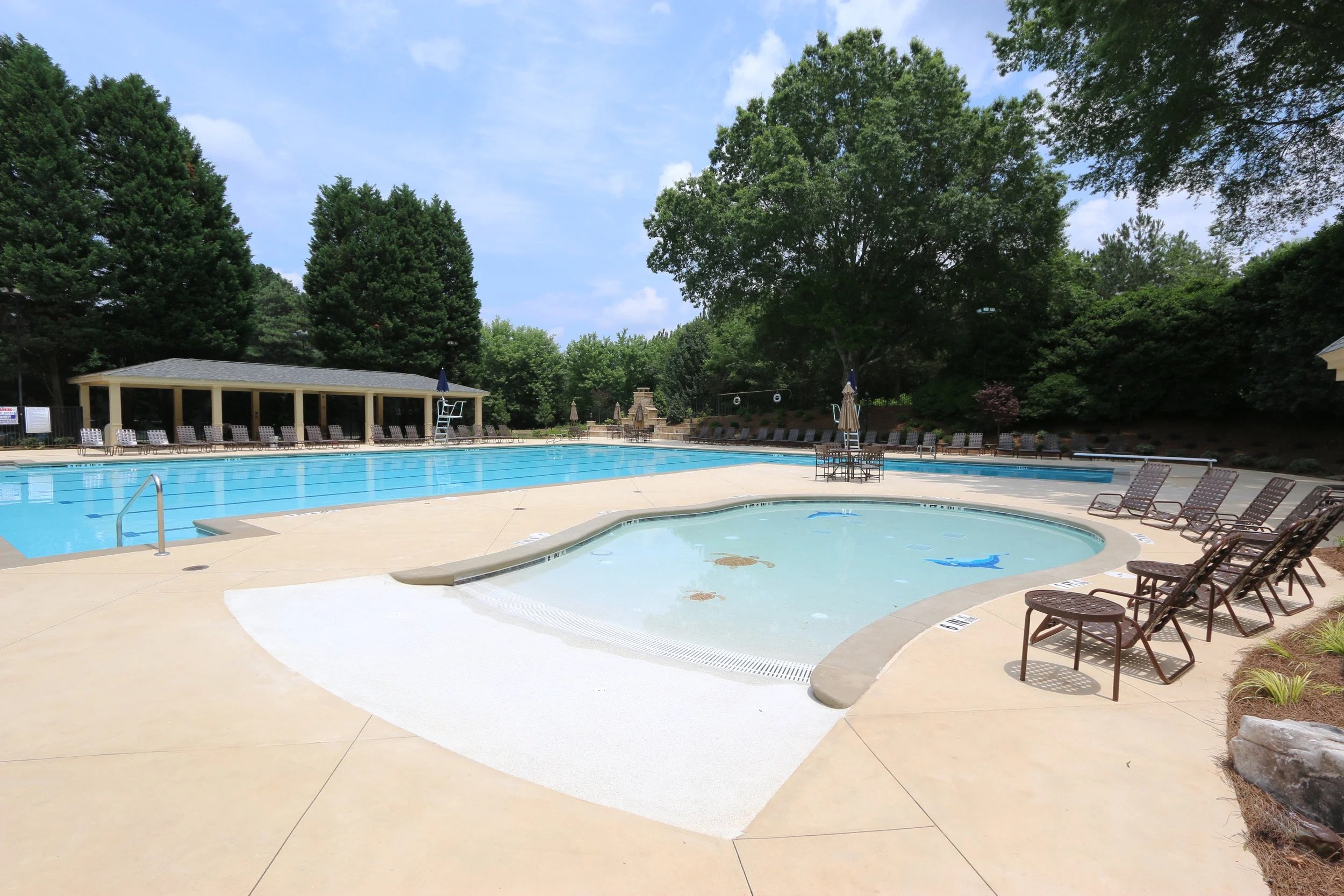 urban-foundry-sibley-forest-clubhouse-renovation-exterior-back-patio-pool.jpeg