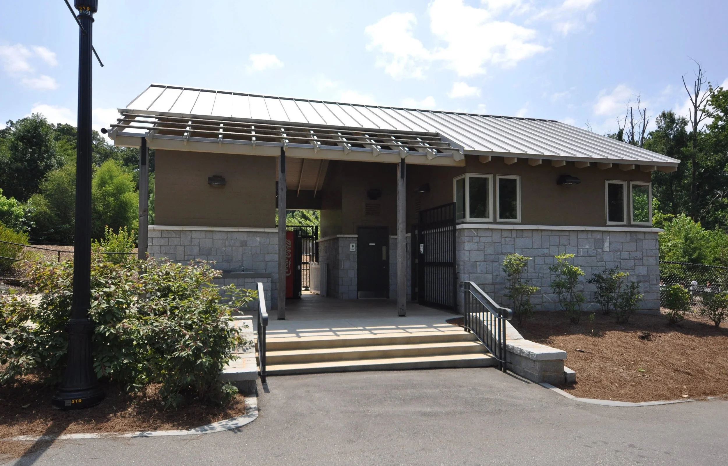  urban-foundry-sandy-springs-lost-corner-nature-preserve-historic-renovation-front-exterior-stairs.jpeg