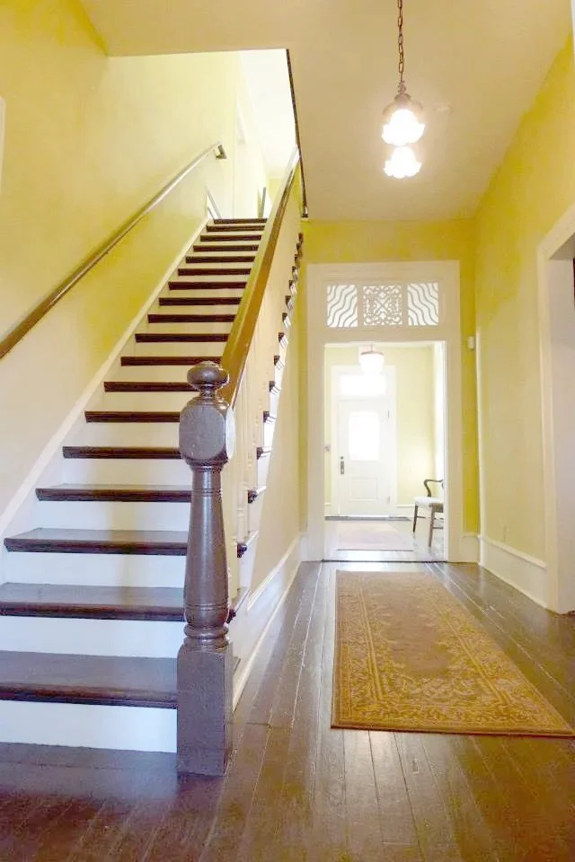  urban-foundry-clarkston-city-hall-annex-historic-morris-family-house-renovation-interior-stairway-hallway.jpeg