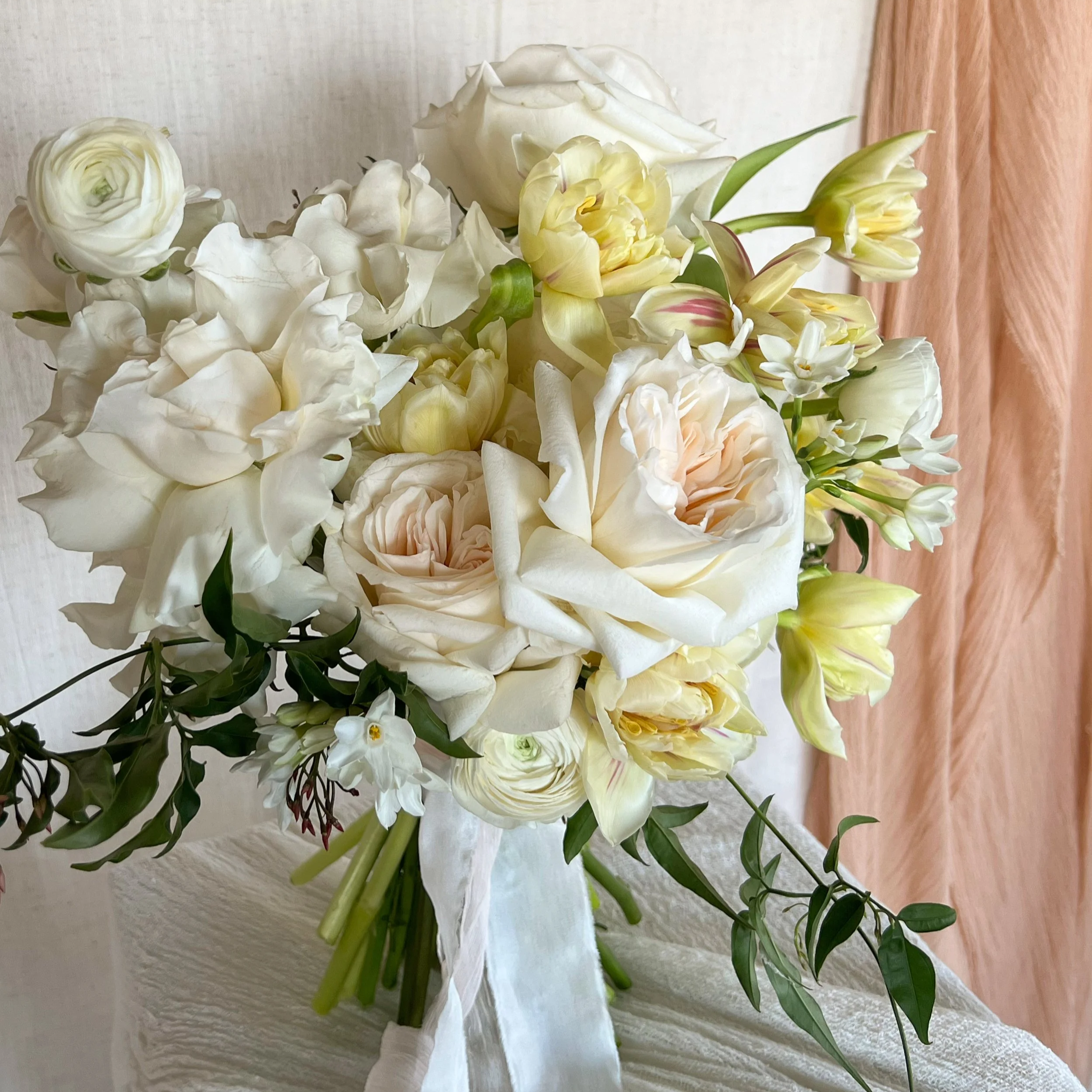 cream, blush and lemon yellow bridal bouquet, with white silk ribbon