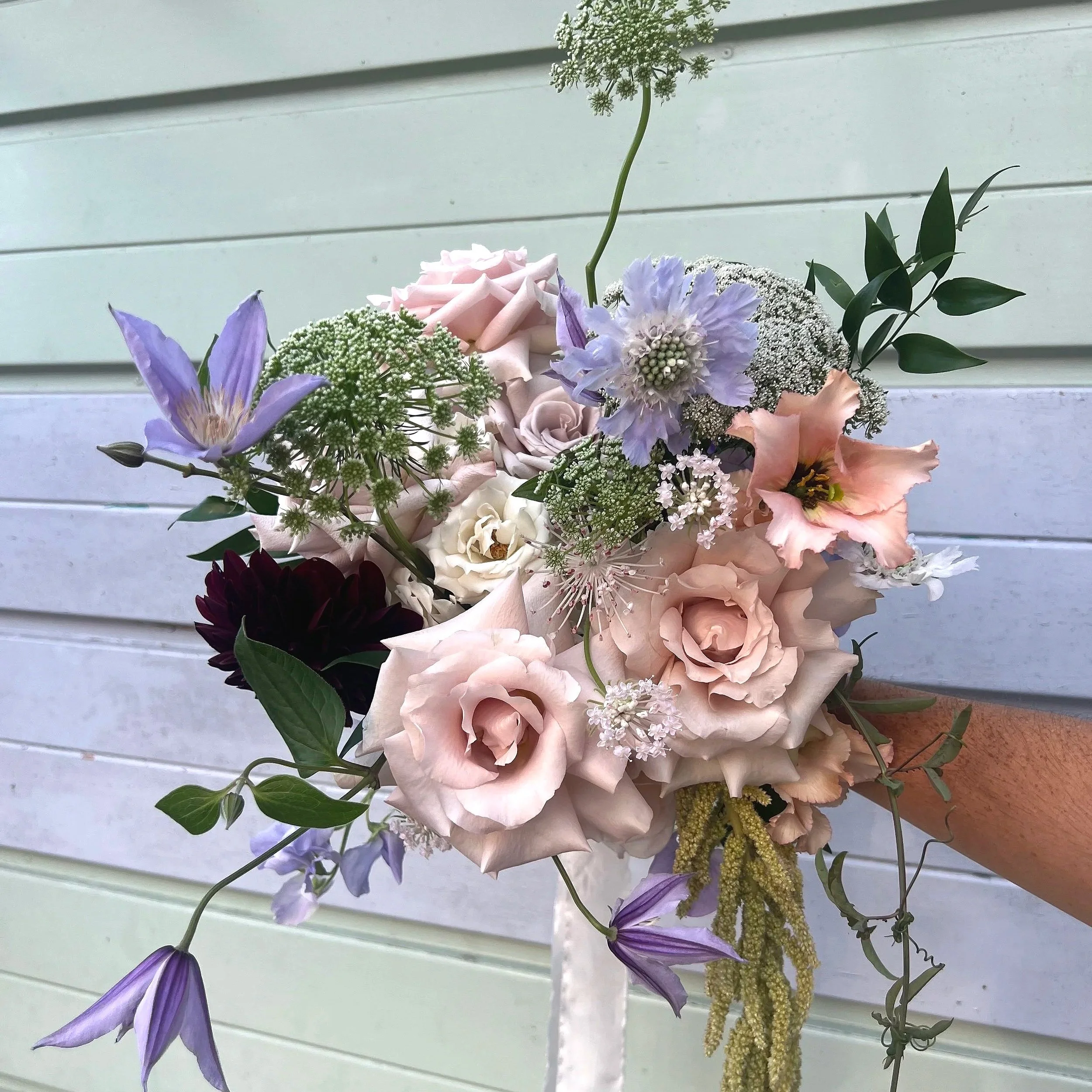 blush pink, lilac, green and burgundy bridal bouquet for an August wedding